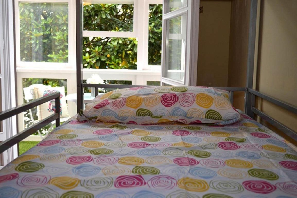 Cama en Habitación Compartida Mixta de 9 Camas