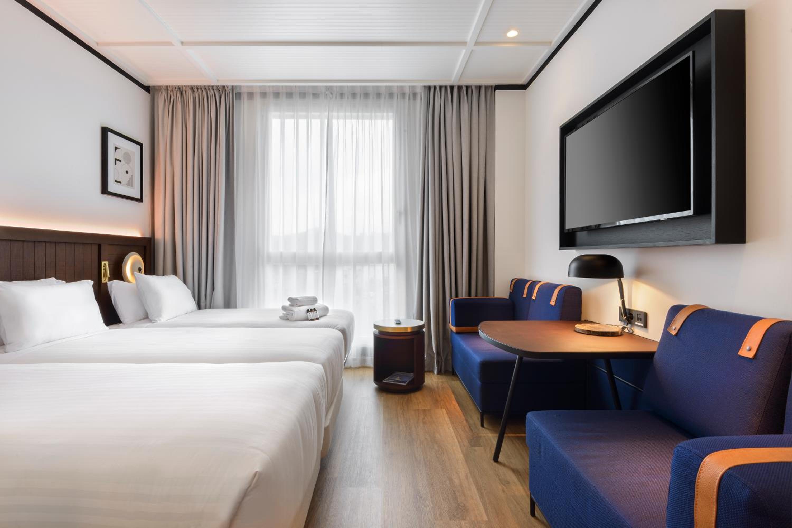 Triple Room (2 Adults + 1 Child) - Photo 1