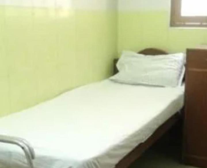 Single Bed in Male Dormitory Room