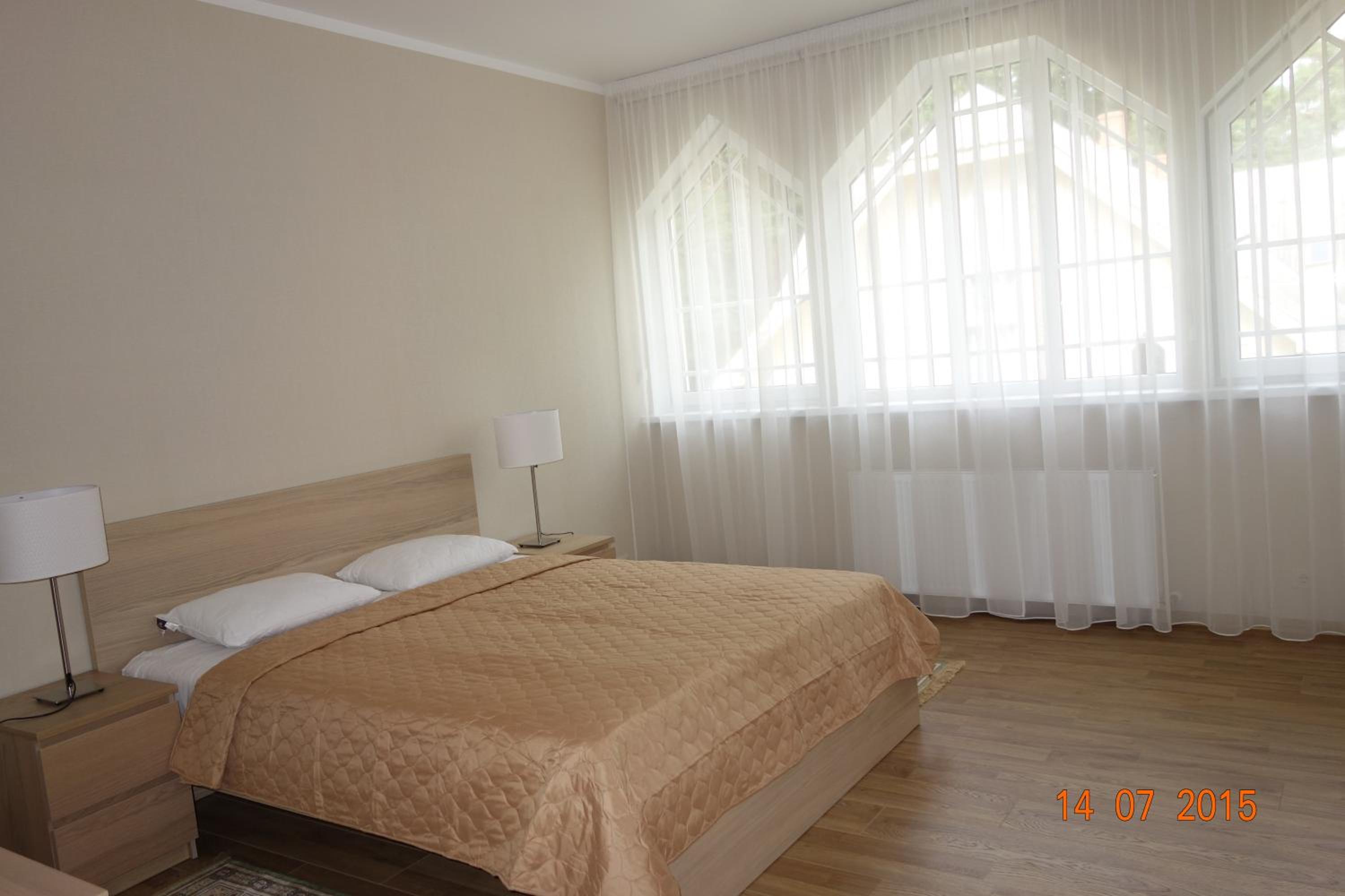 Four-Bedroom Apartment - Photo 1