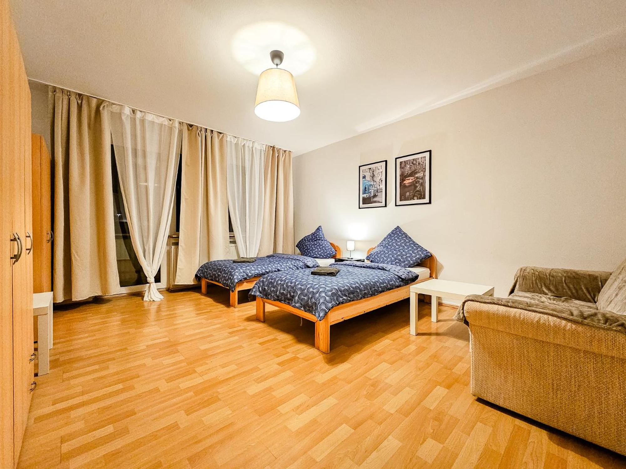 Three-Bedroom Apartment with Balcony photo 1