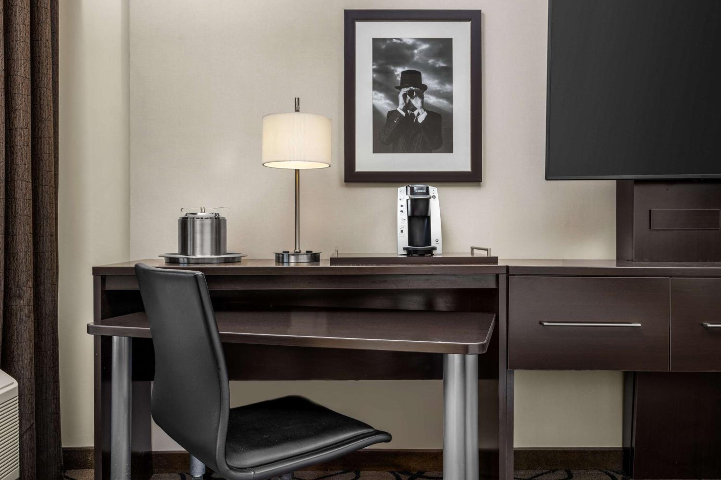 Your perfect workspace awaits in this stylish hotel room.