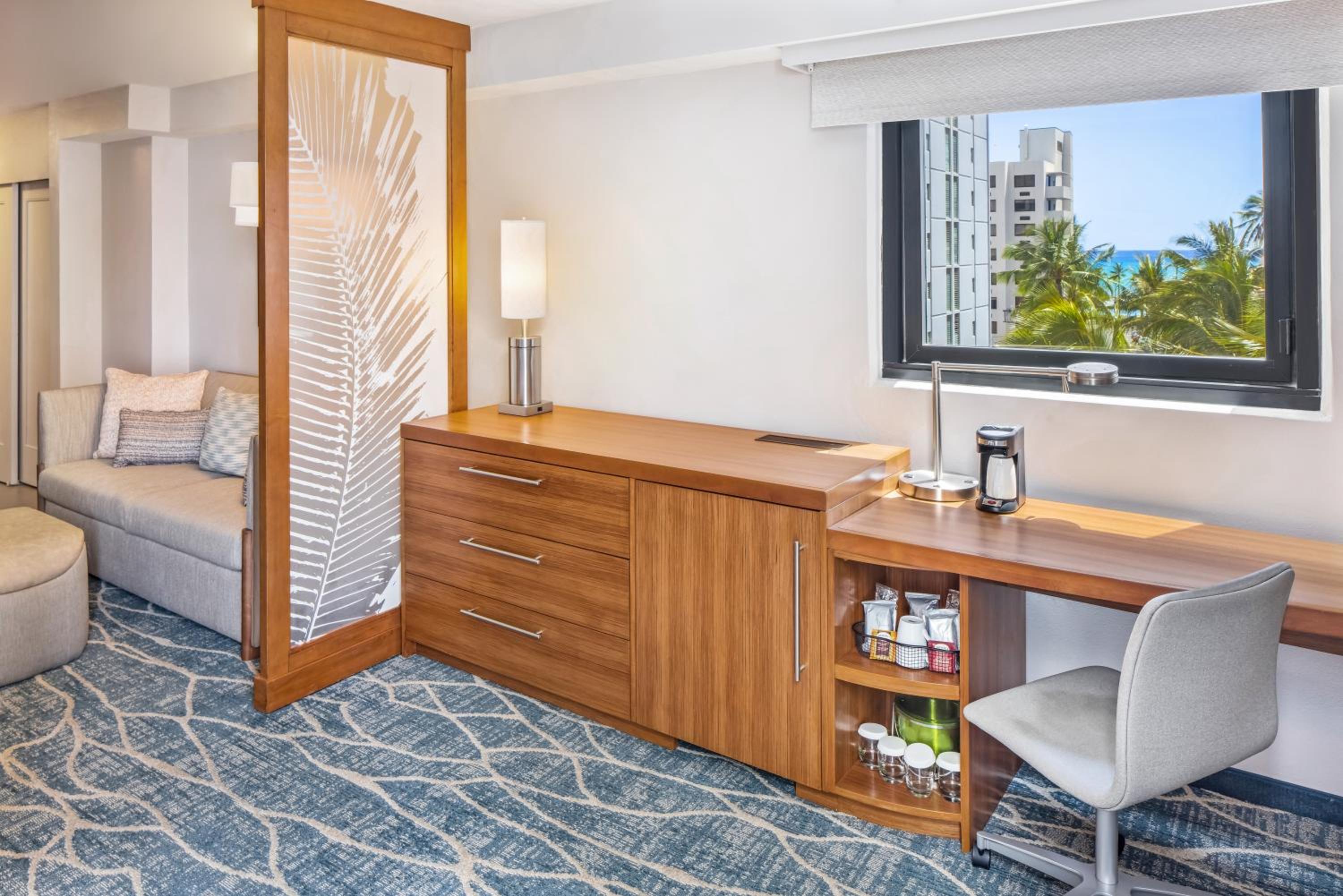 Queen Room with Two Queen Beds with Sofa Bed, City View and Tub - Disability Access