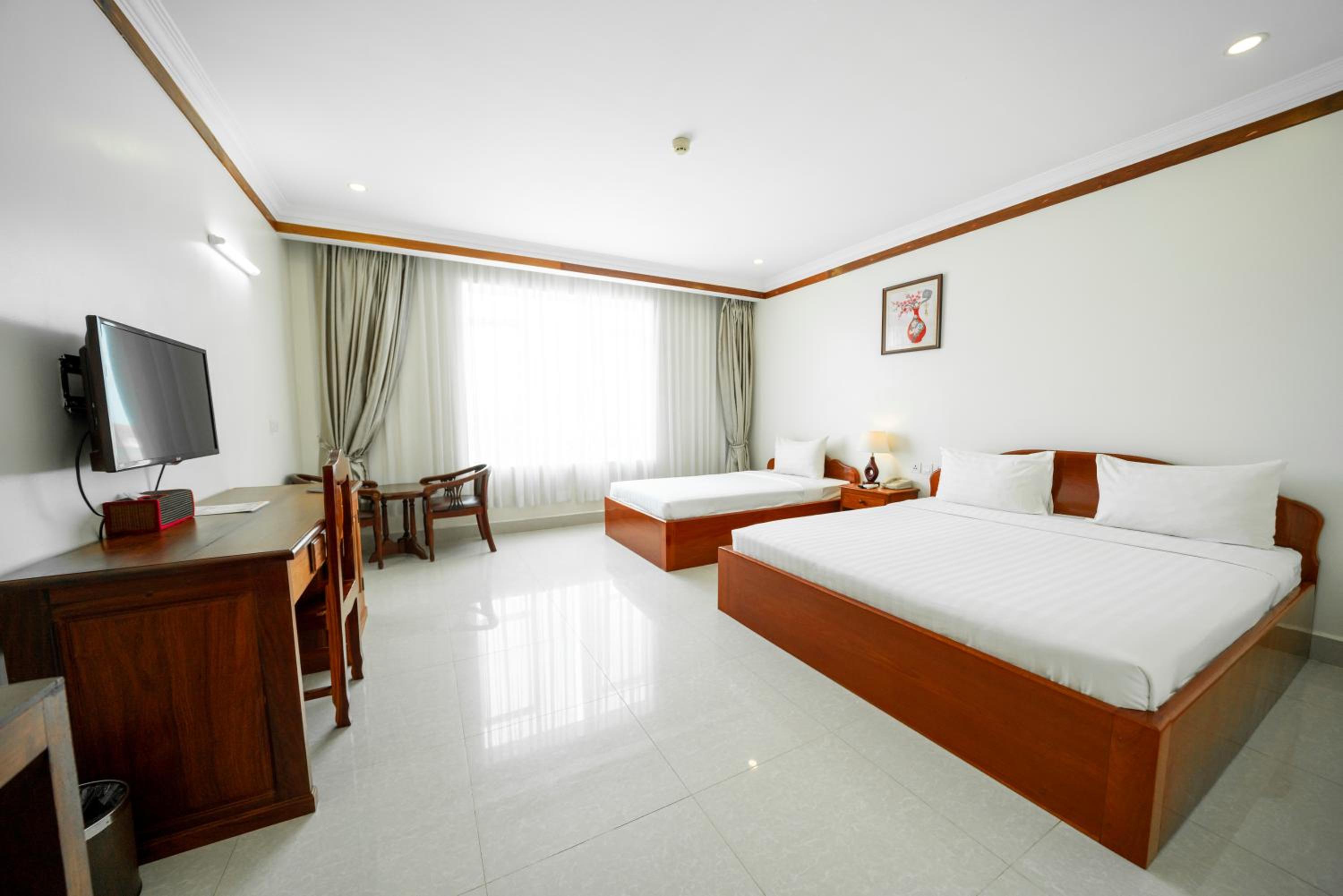 Standard Twin Room - Photo 4