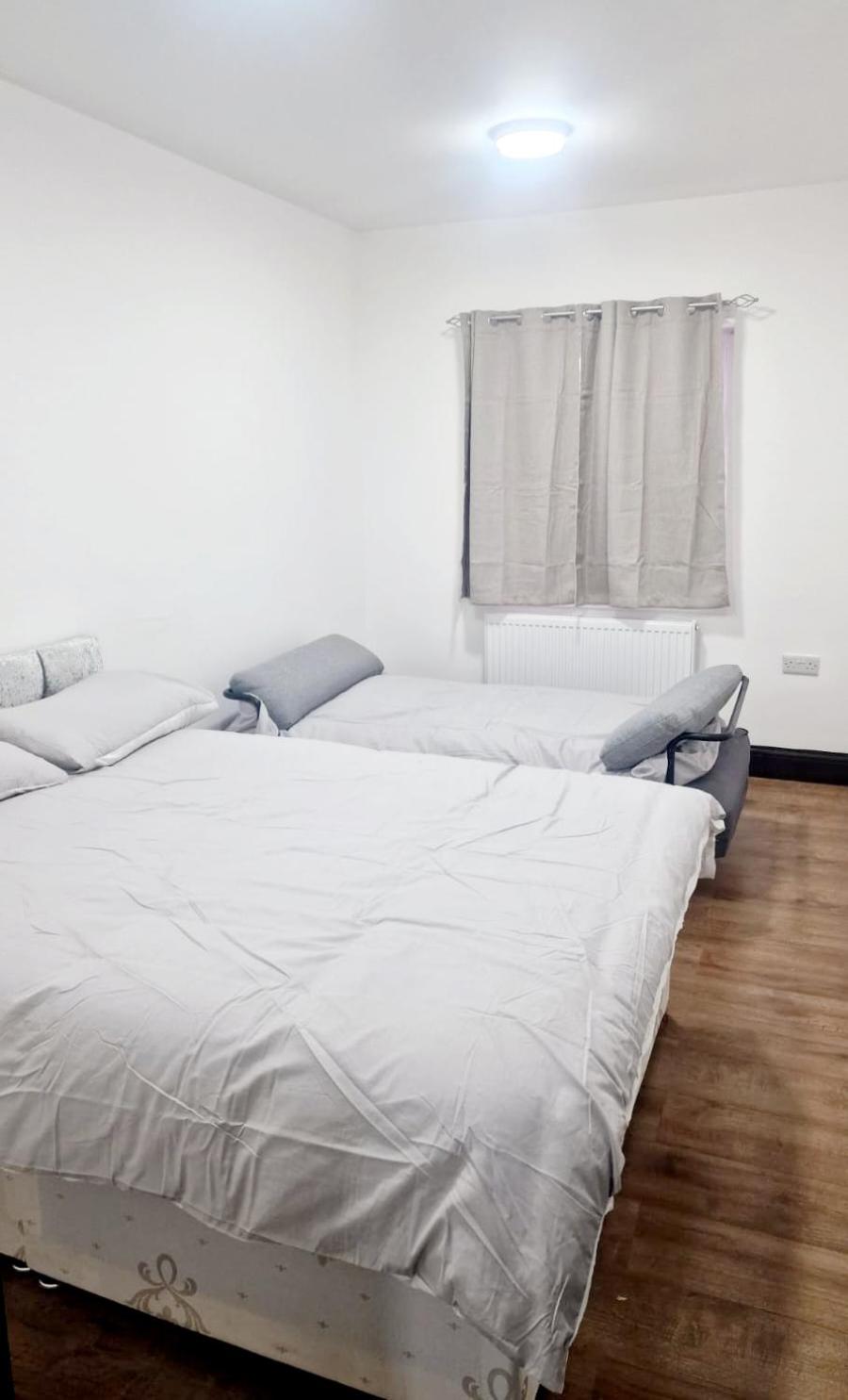 Three-Bedroom Apartment photo 2