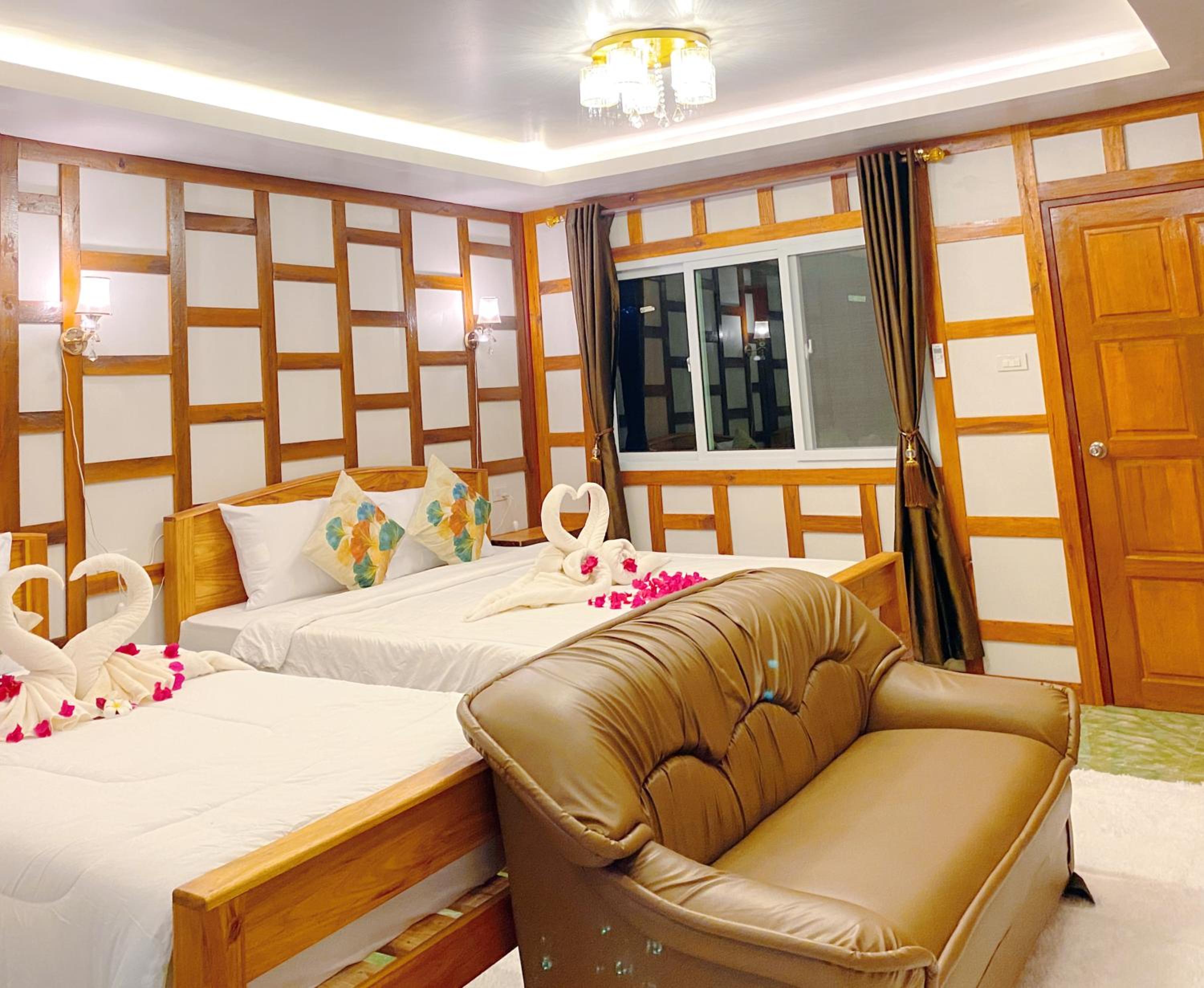 Deluxe Triple Room - Photo 11
