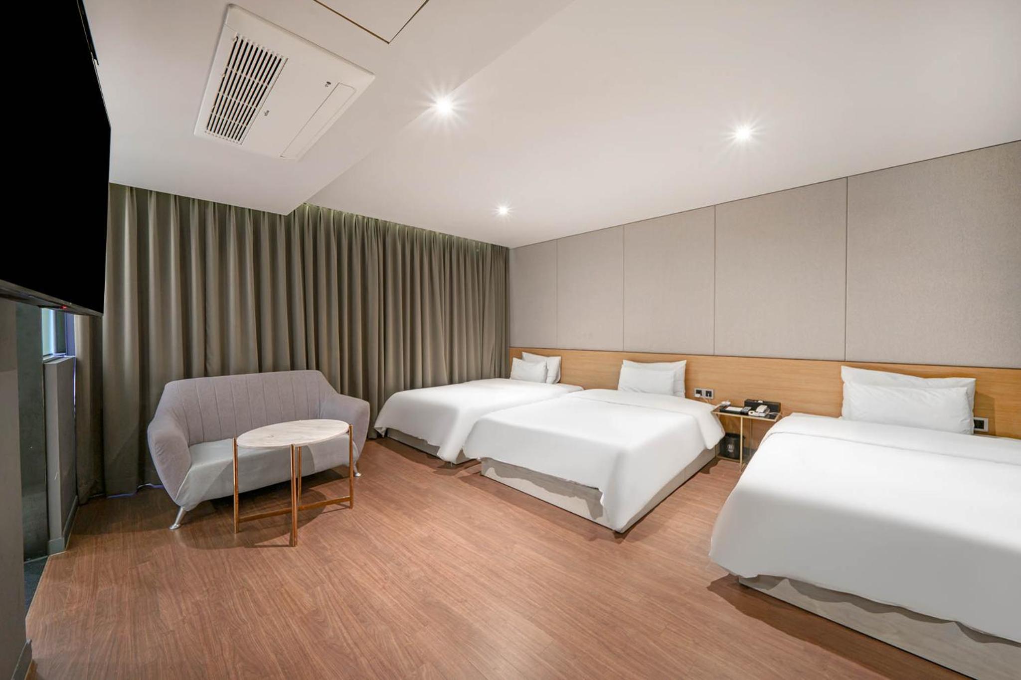 Deluxe Triple Room - Photo 7