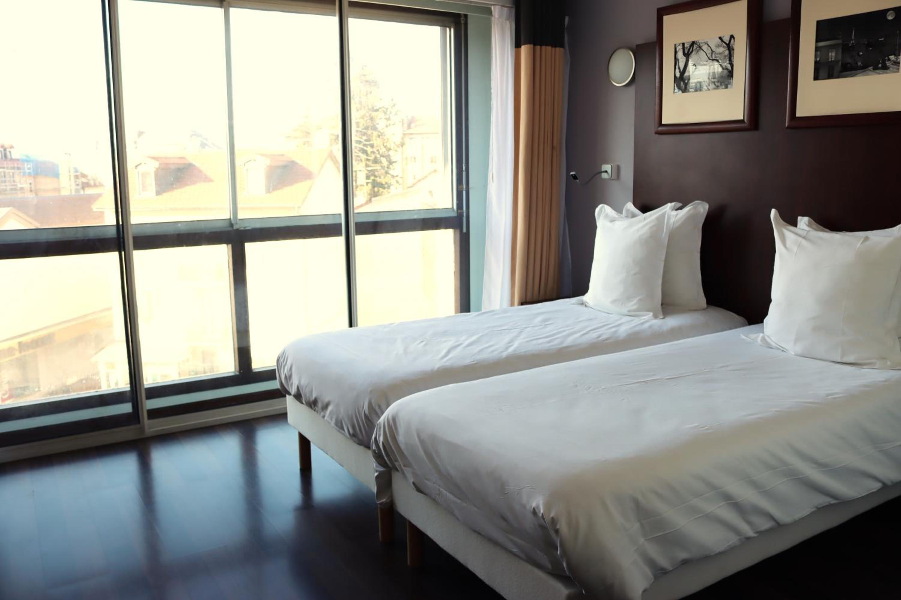 Twin Room - Photo 1