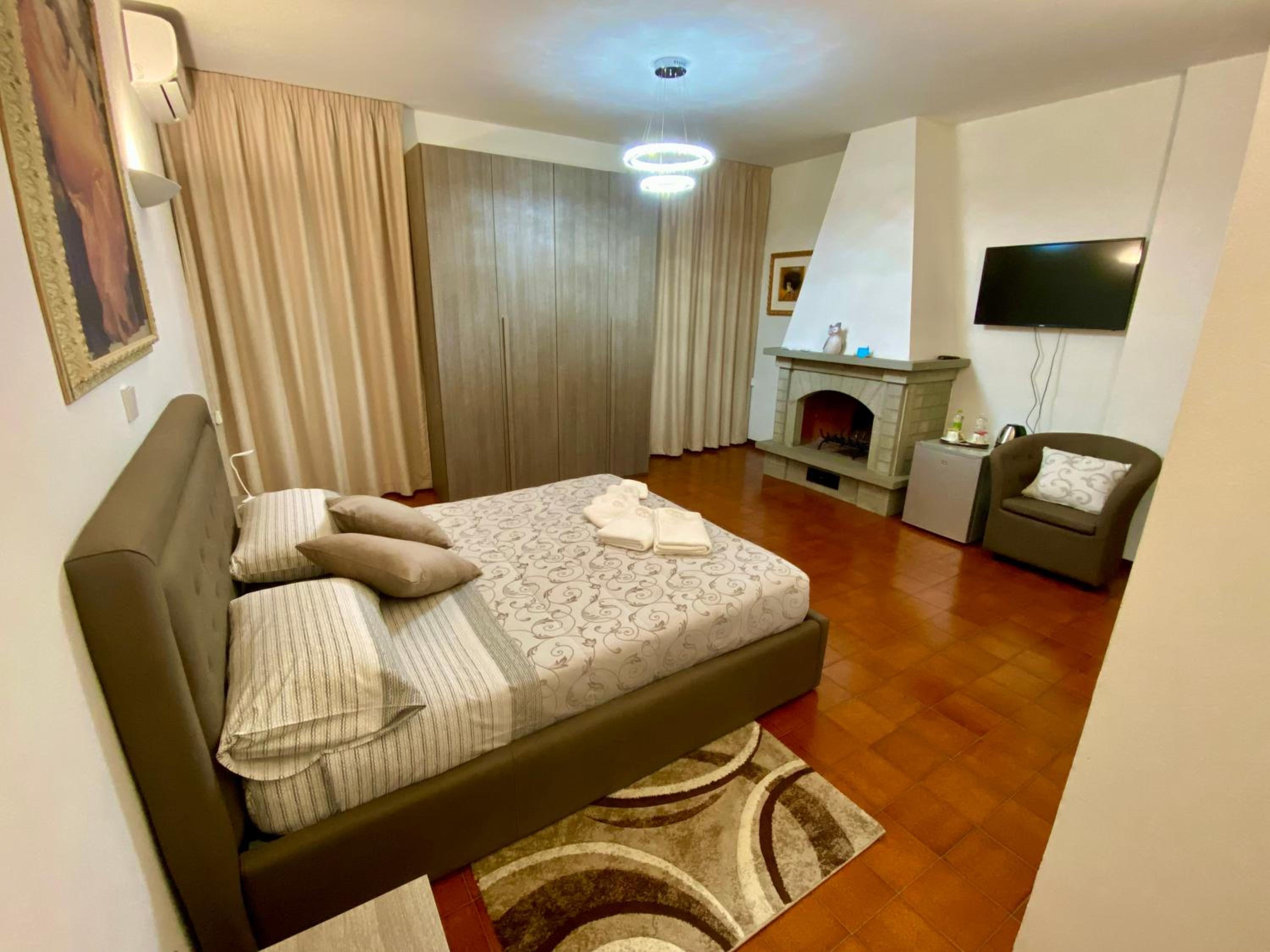 Deluxe Room - Photo 1