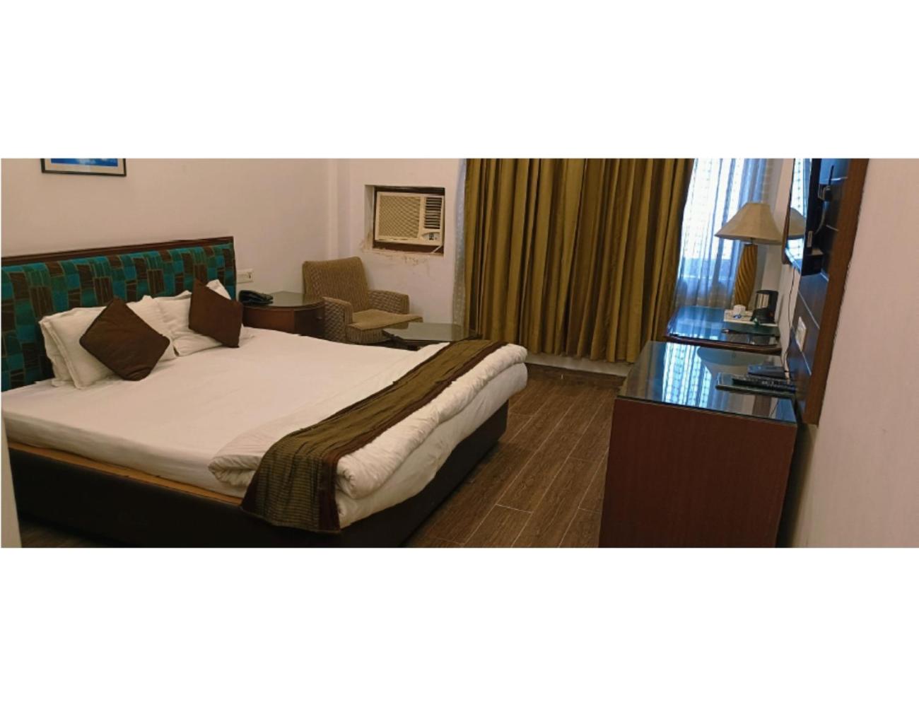 Deluxe Room - Photo 1