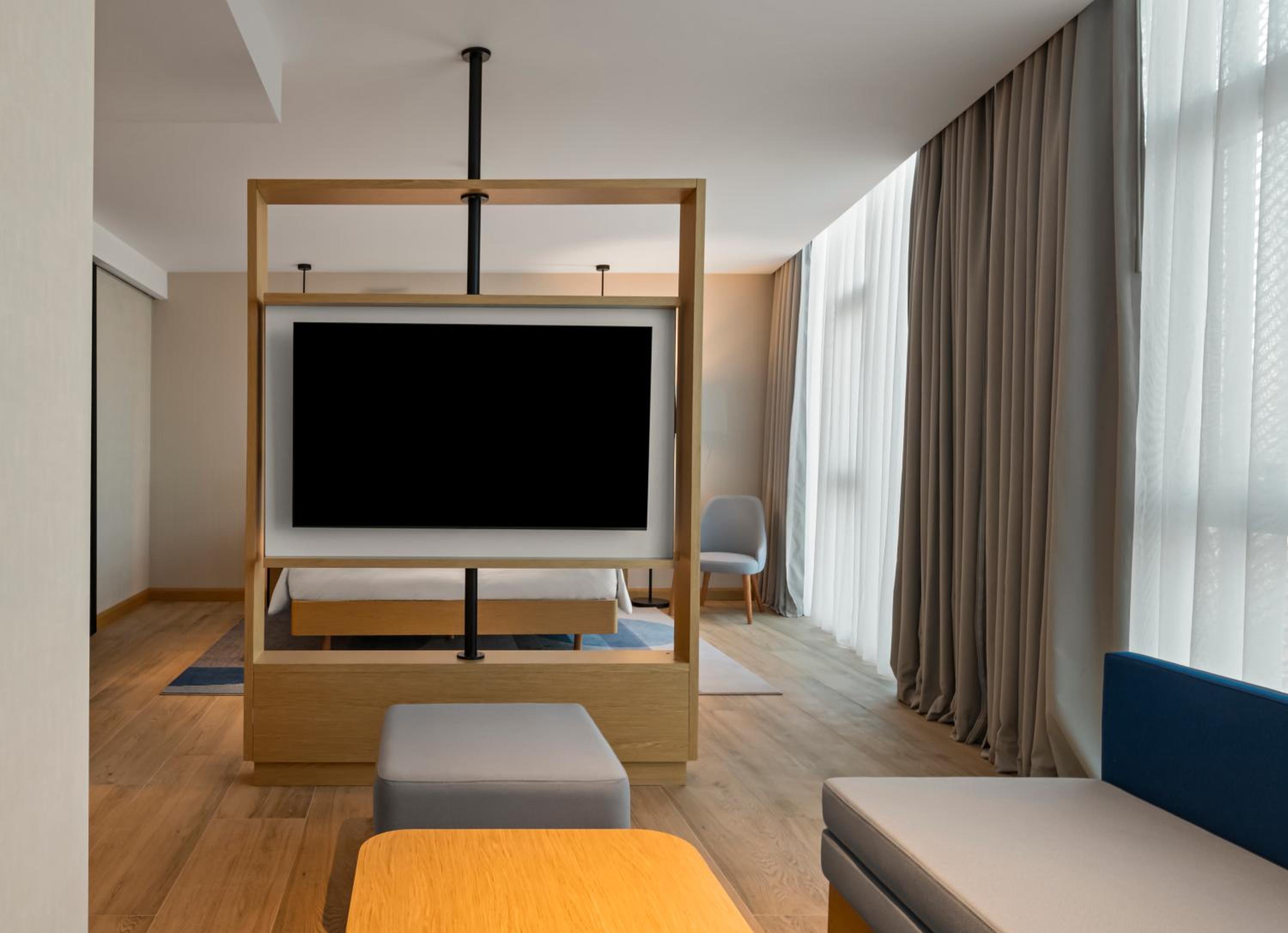 Deluxe King Room with Sofa Bed - Photo 1