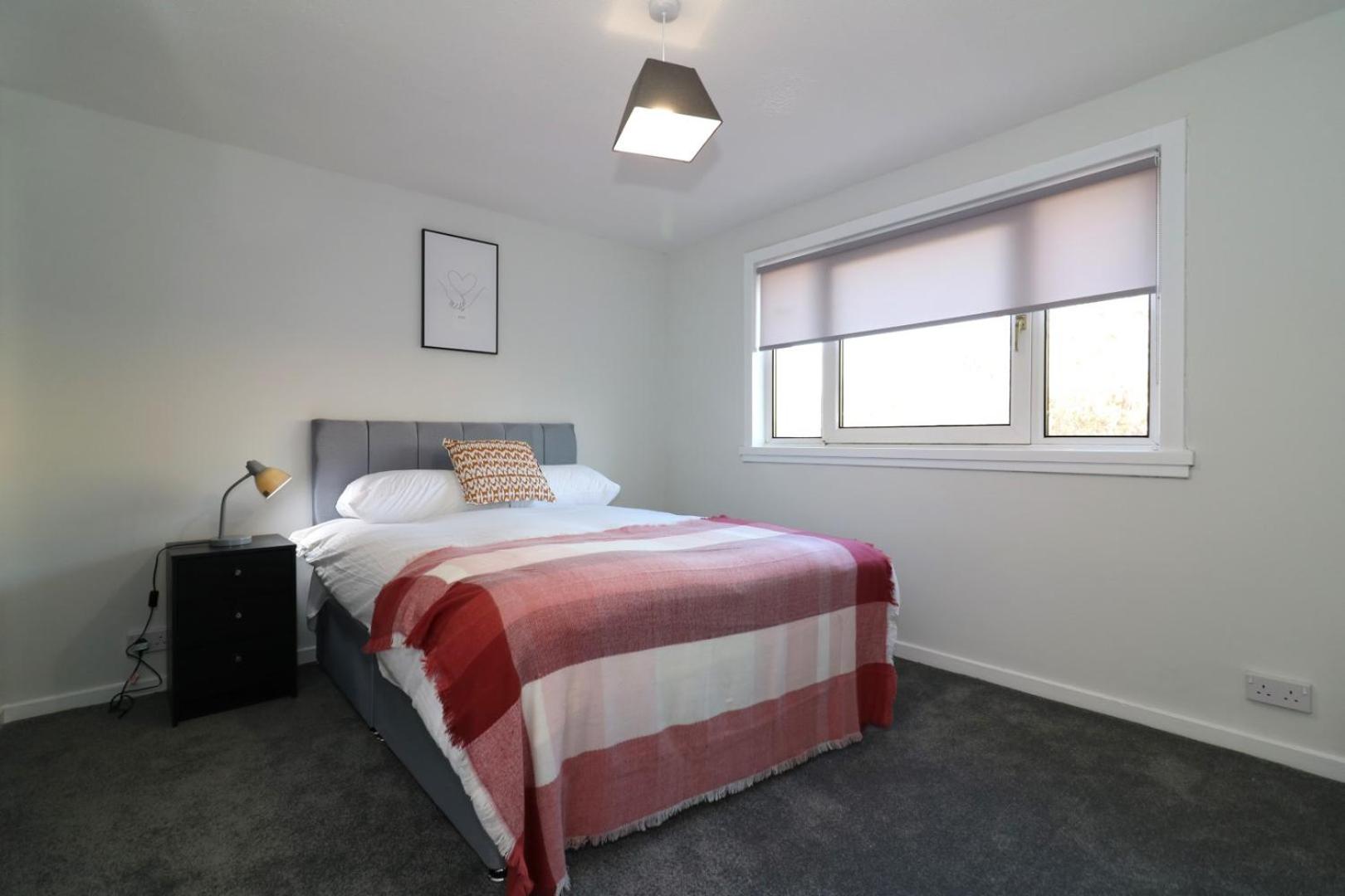 Three-Bedroom Apartment photo 2