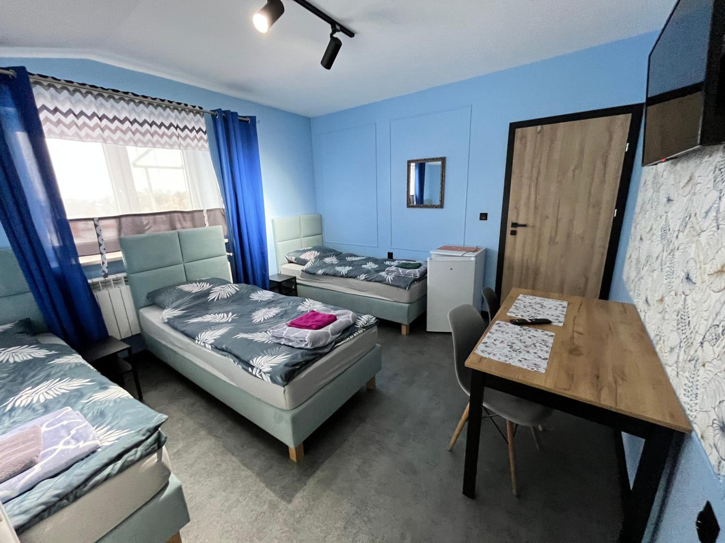 Deluxe Triple Room - Photo 2