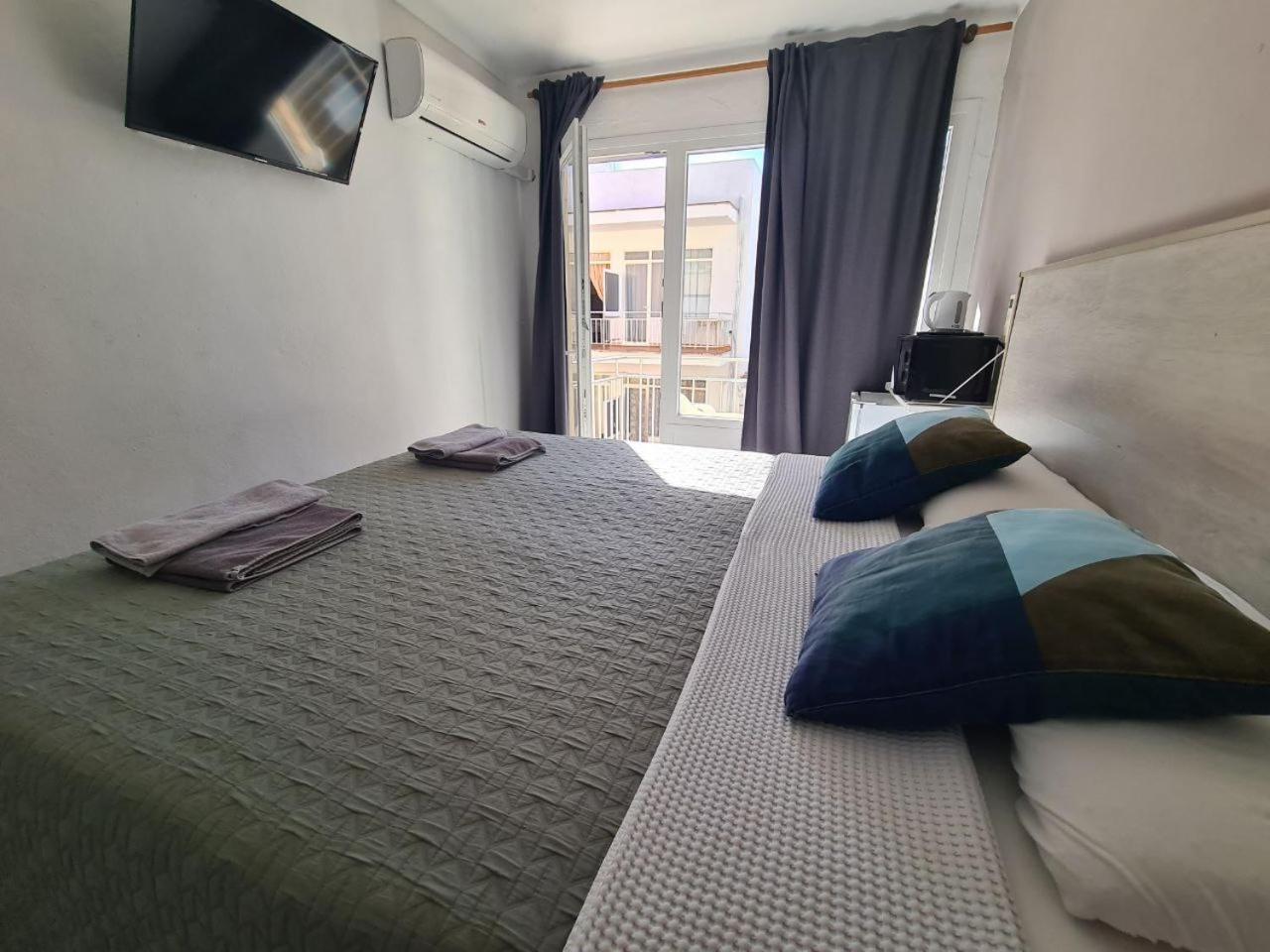 Habitación Doble o con Dos Camas con Vista Lateral al Mar.