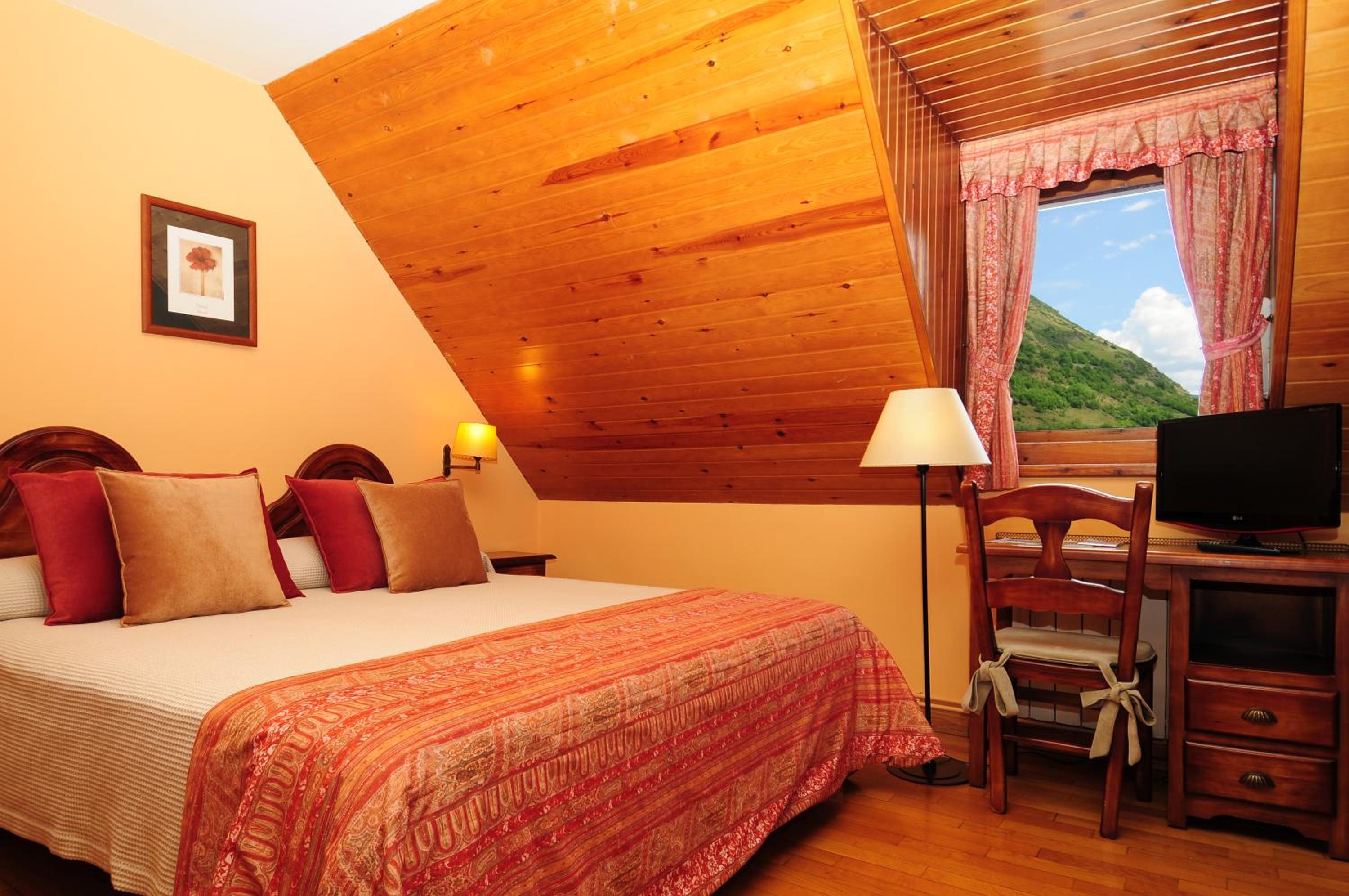 Habitación Cuádruple (2 Adultos + 2 Niños)