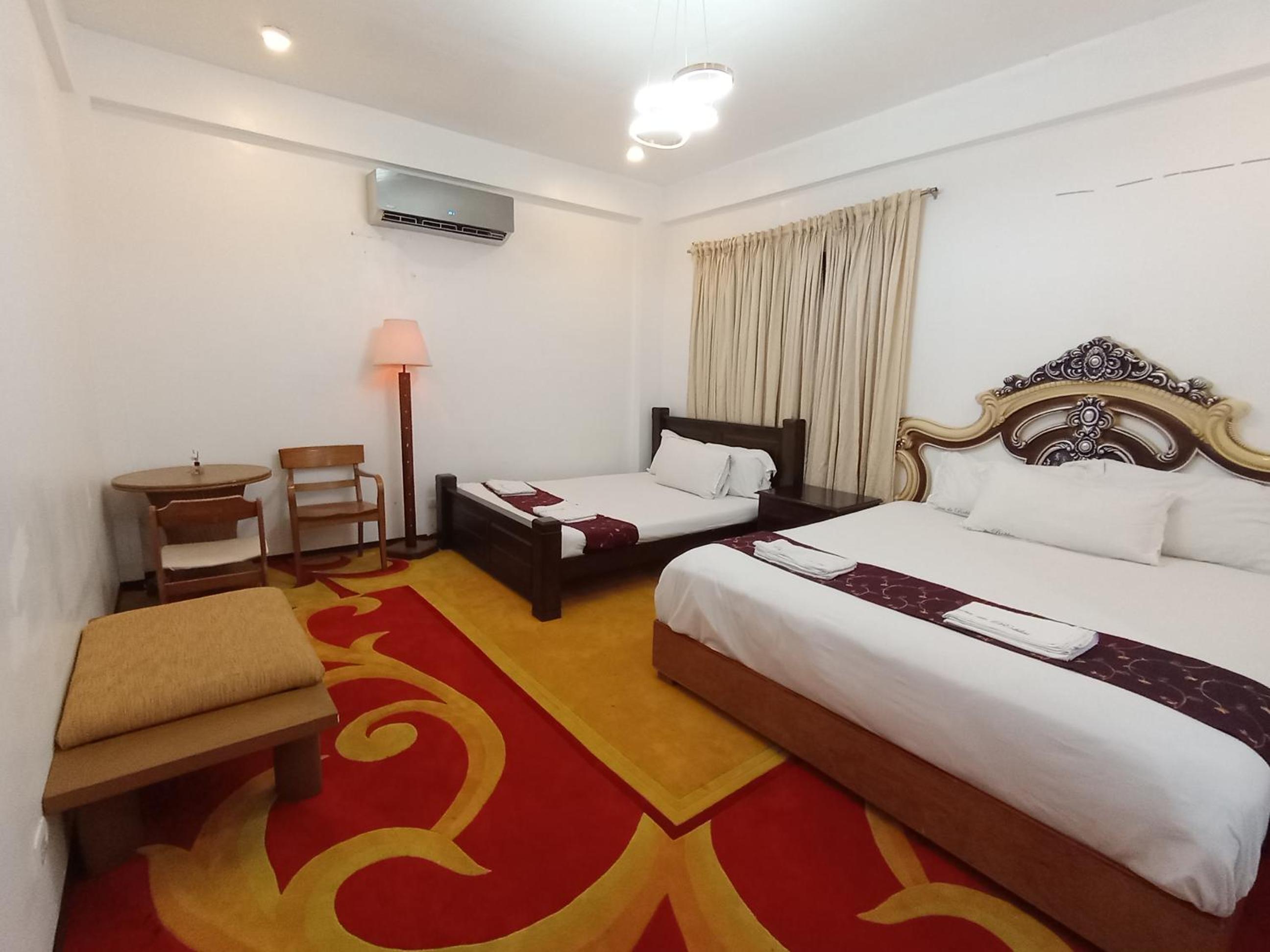 Deluxe Queen Room with Two Queen Beds - Photo 7