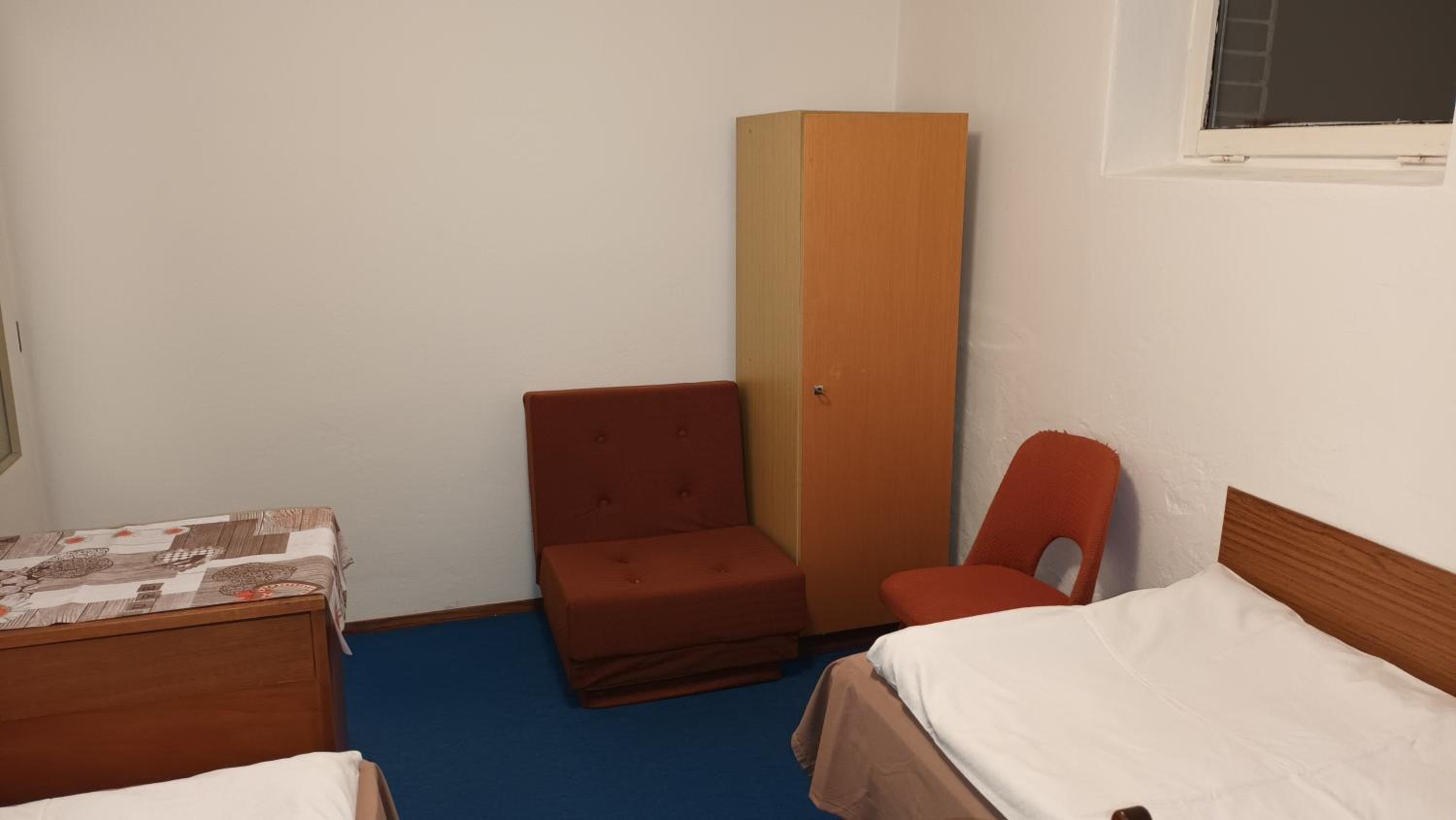 Three-Bedroom Apartment photo 1