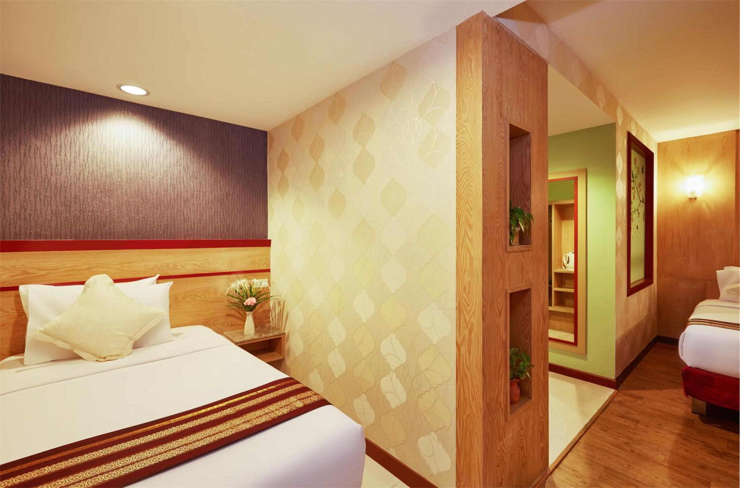 Deluxe Triple Room - Photo 8