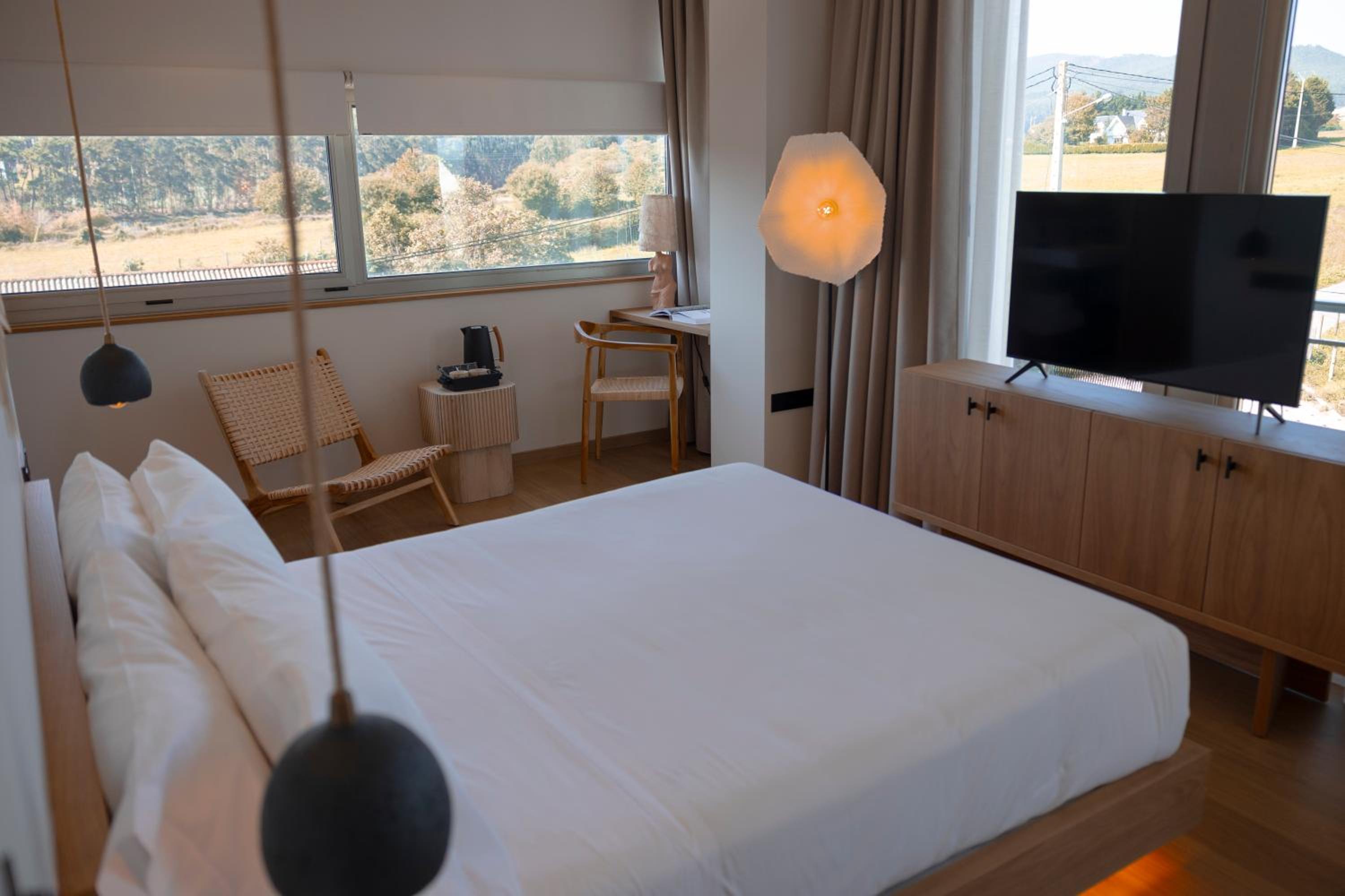 Habitación Doble Deluxe con Vista Lateral al Mar