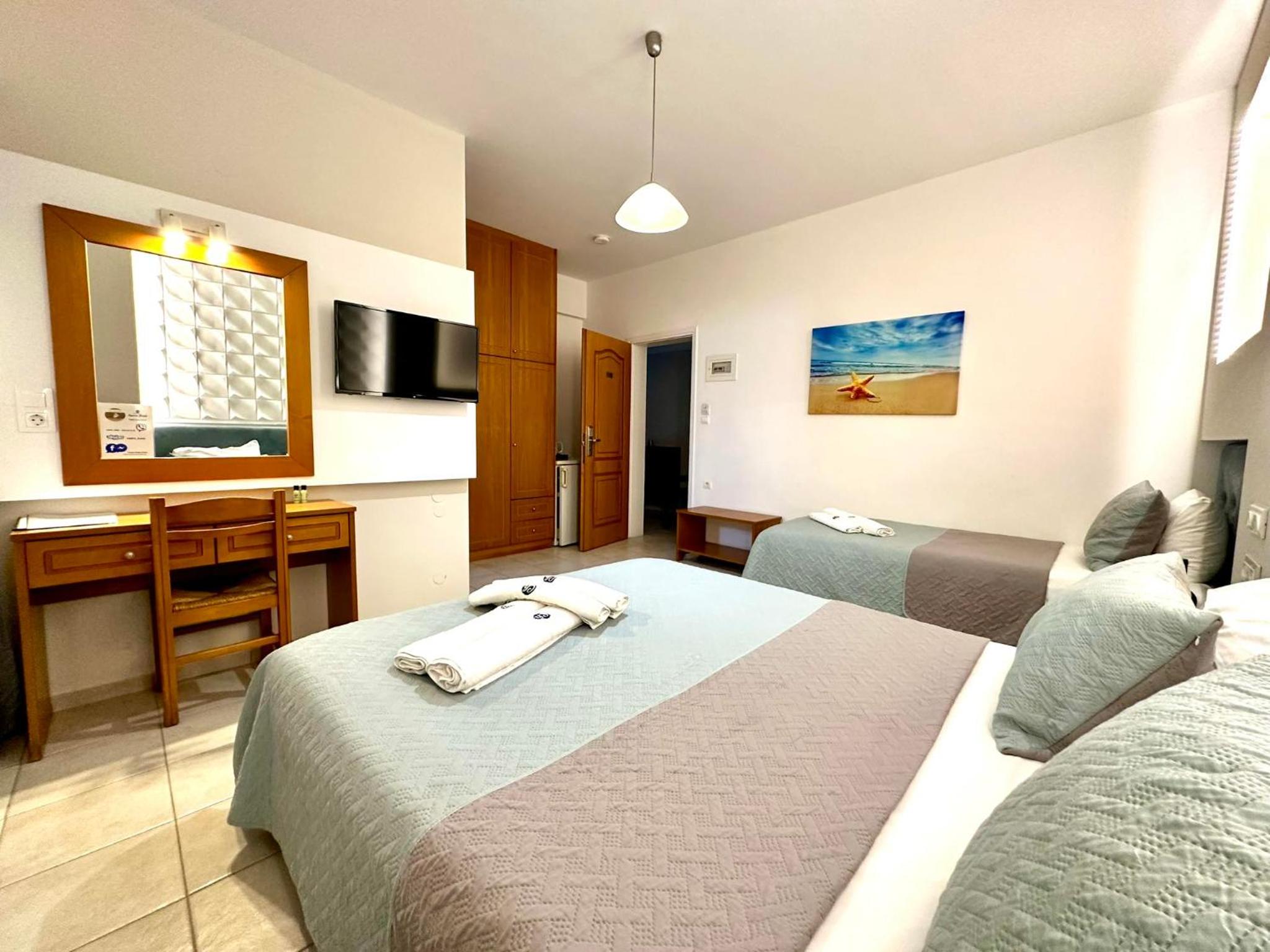 Deluxe Triple Room - Photo 1