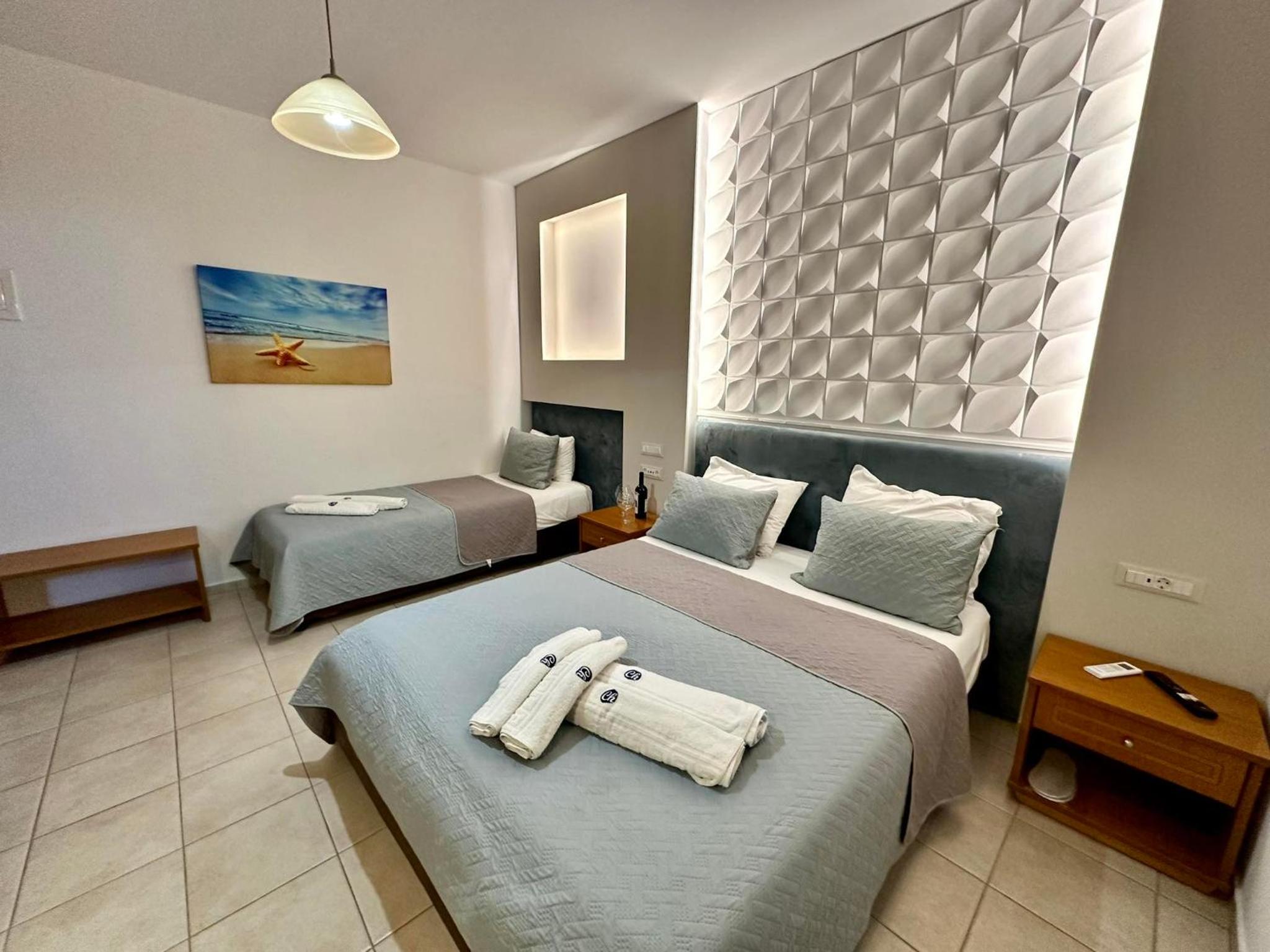 Deluxe Triple Room - Photo 12
