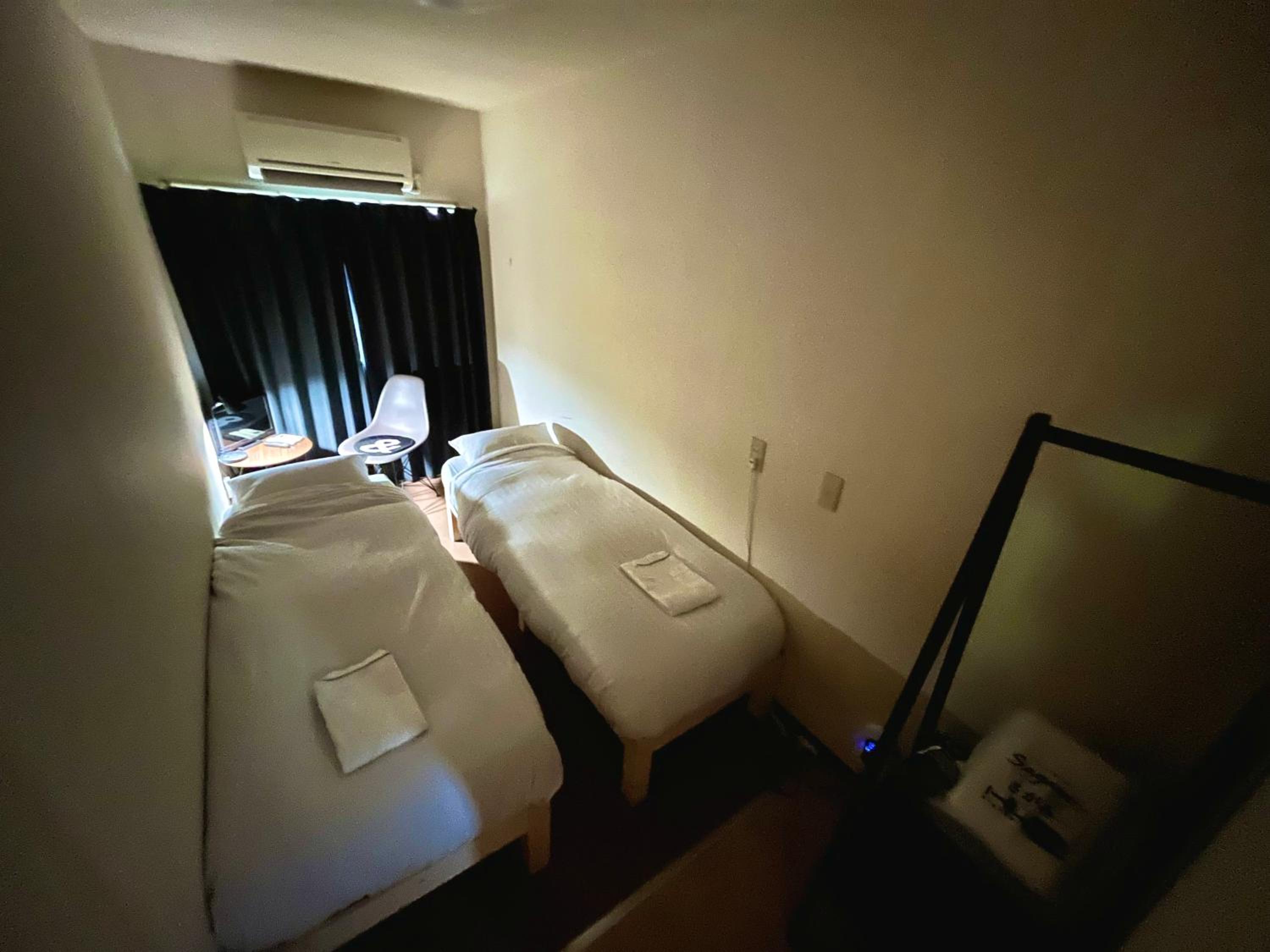 Twin Room with Shared Bathroom photo 2