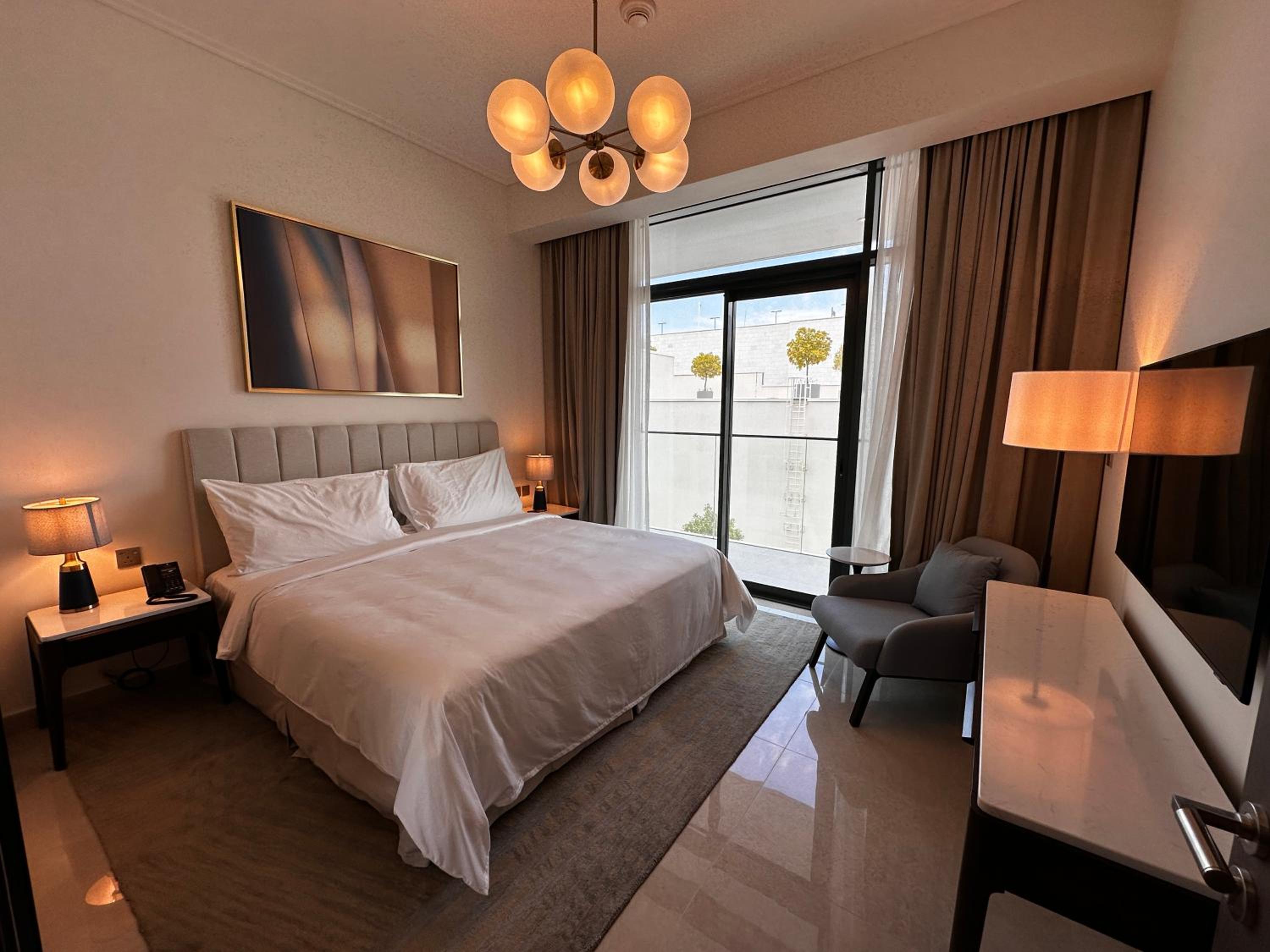 One-Bedroom Apartment with Balcony and City View