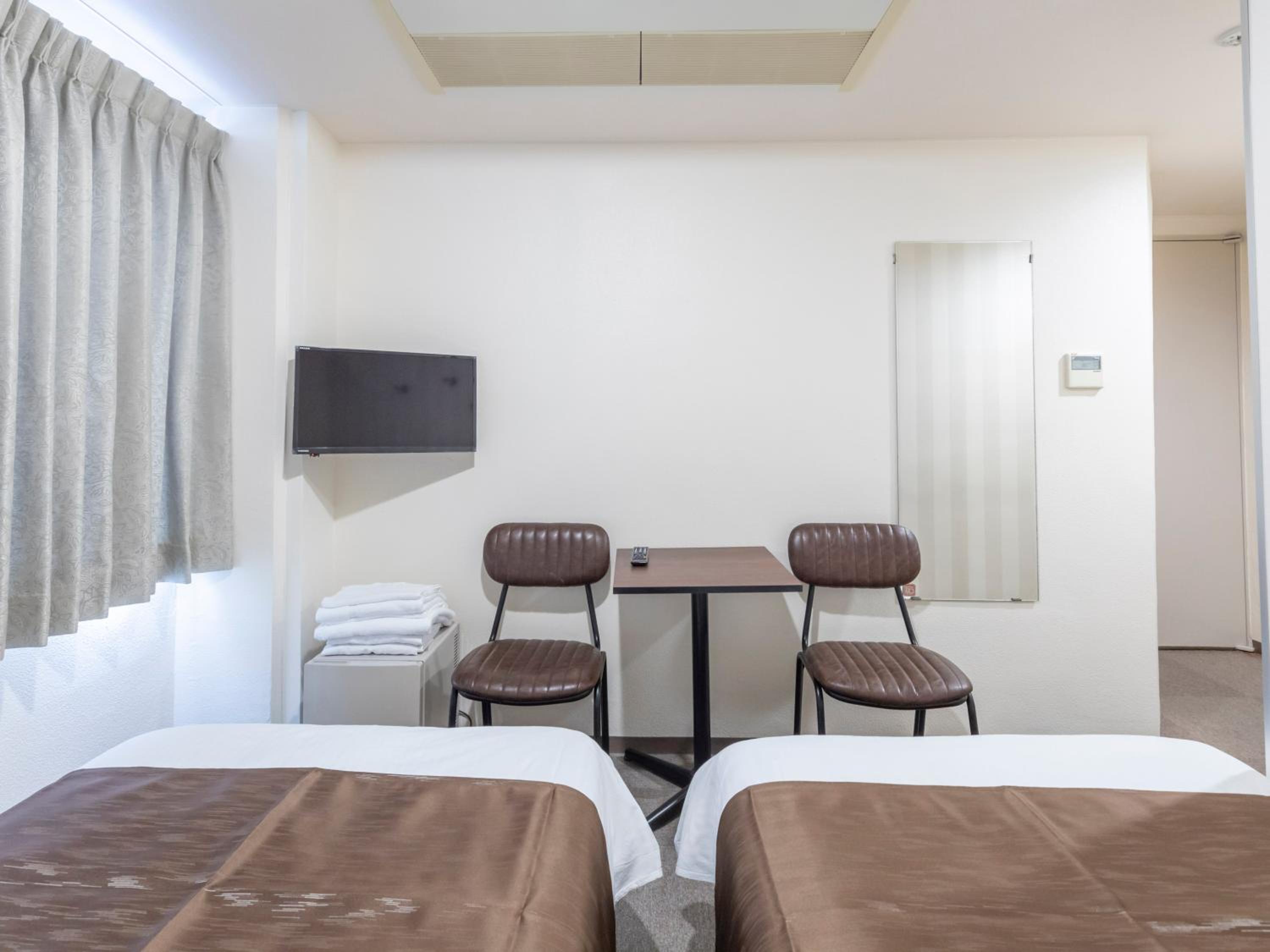 Standard Twin Room - Photo 5