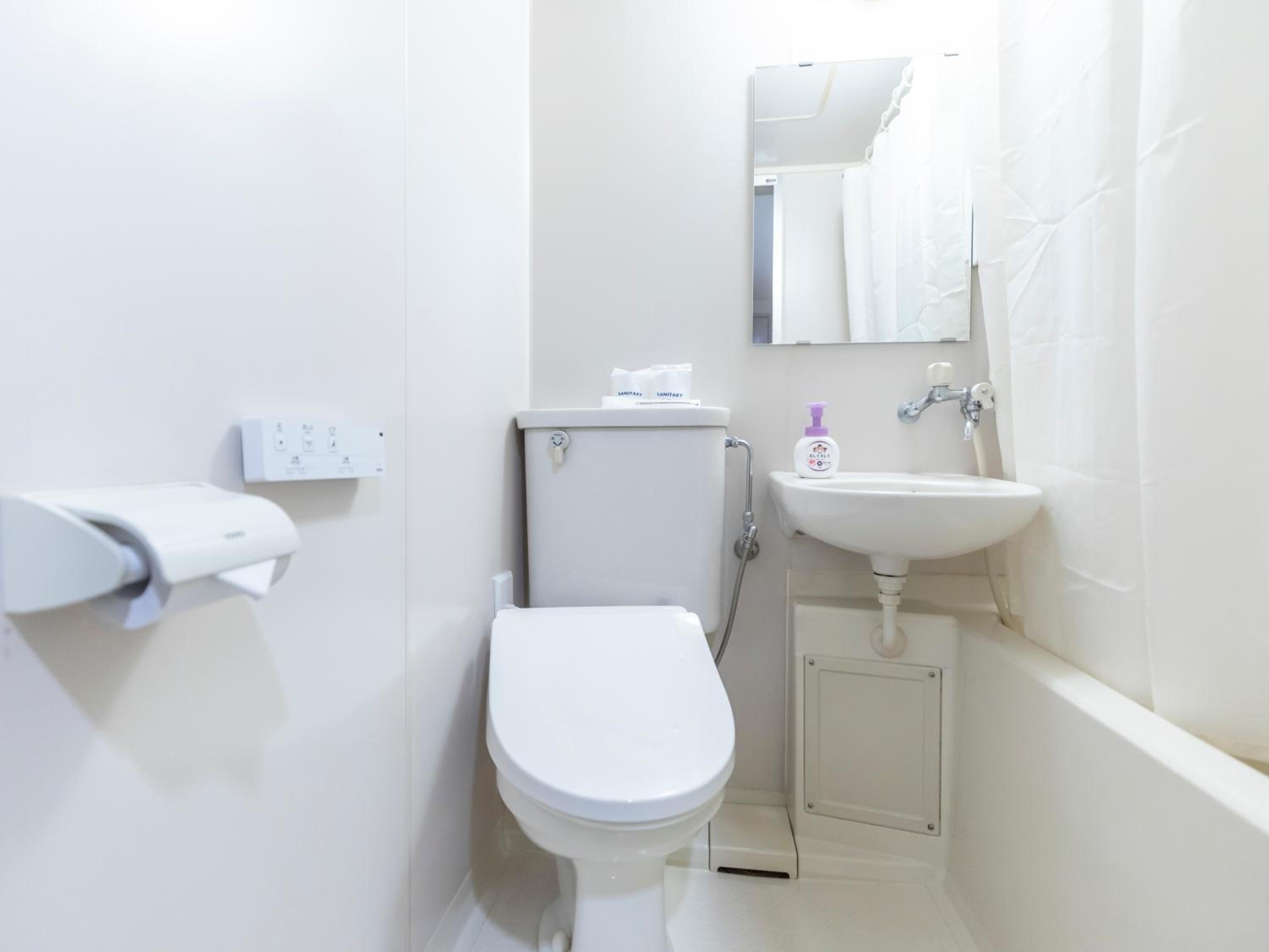Standard Twin Room - Photo 8