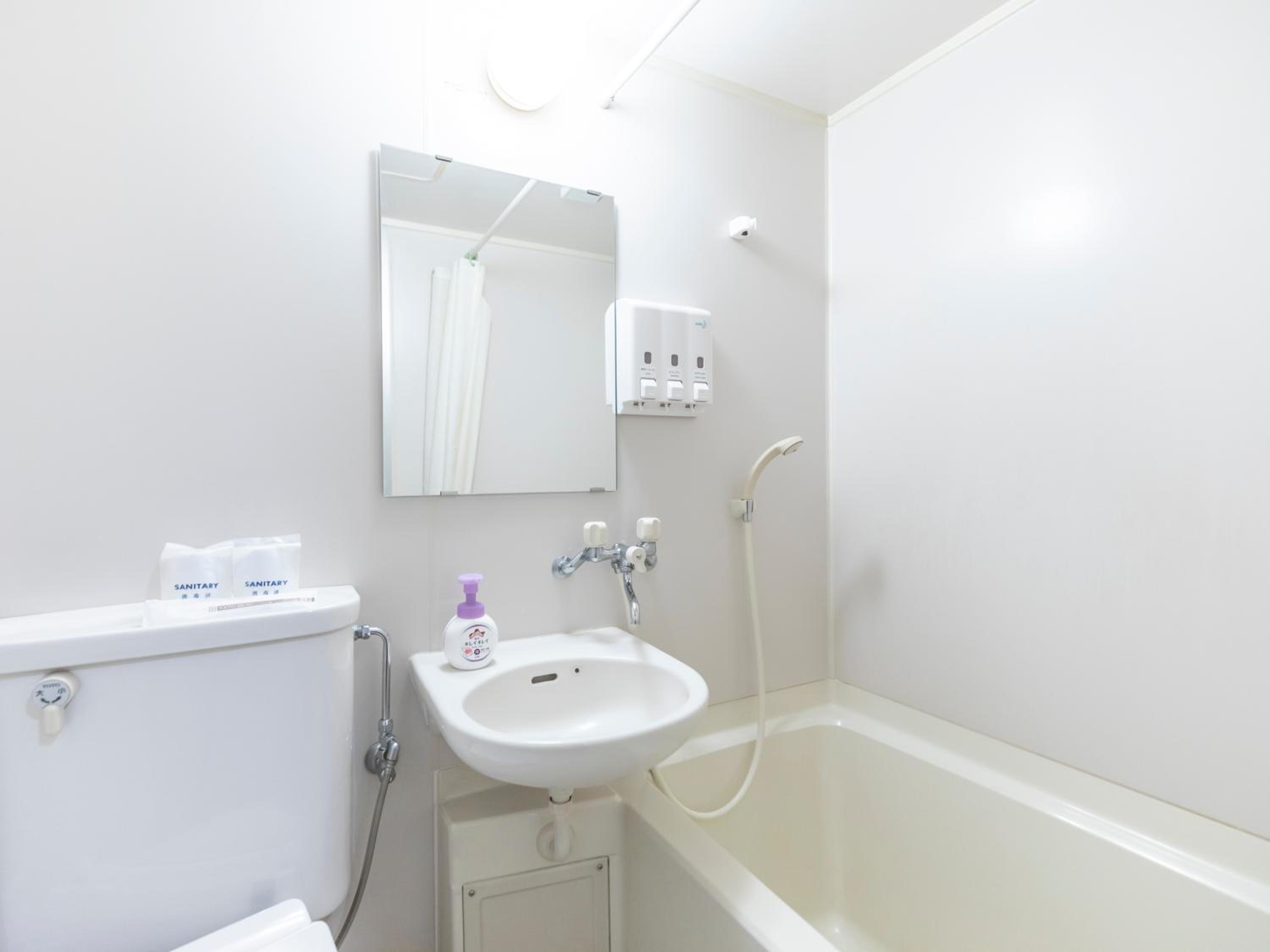 Standard Twin Room - Photo 10