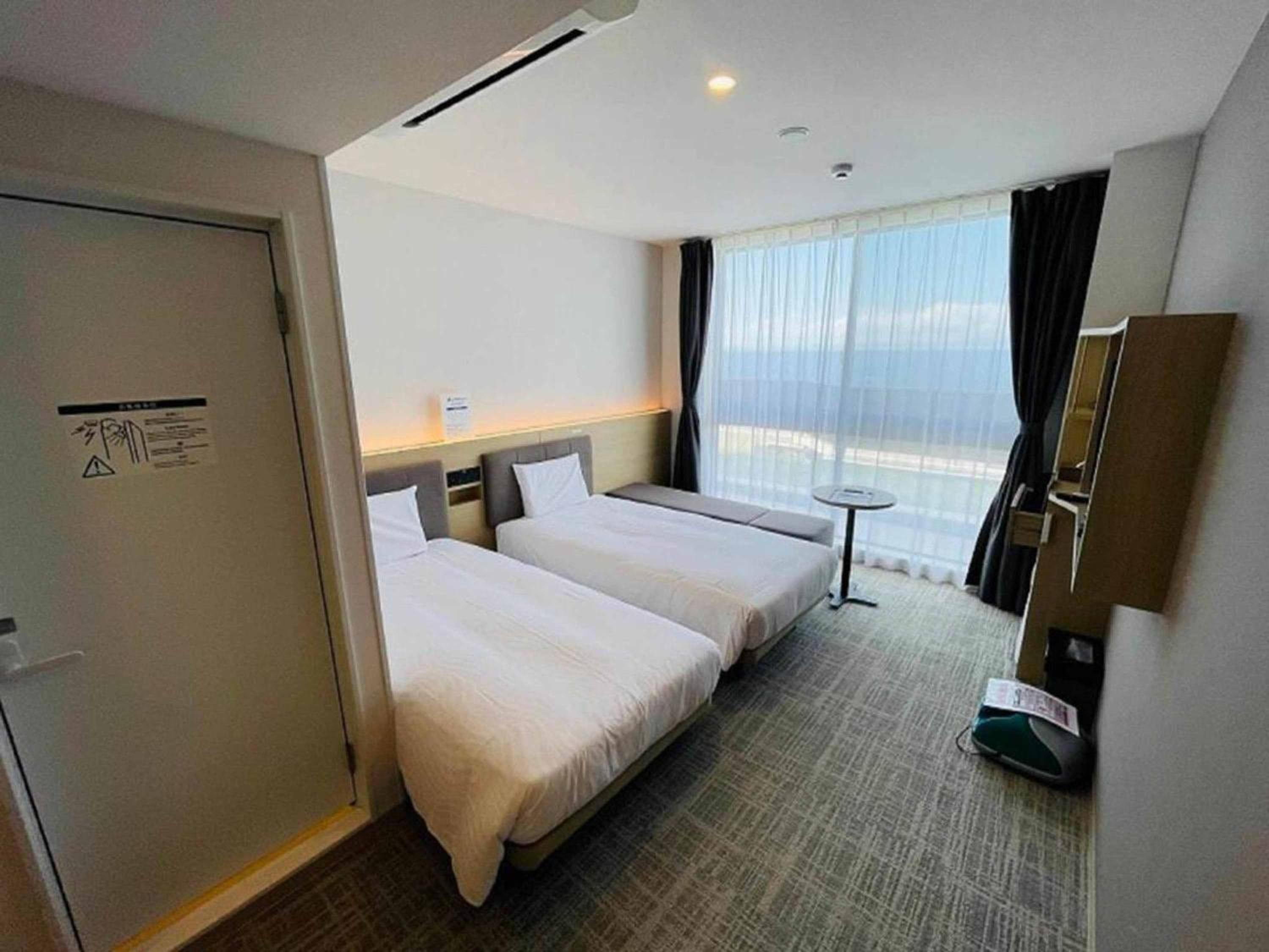 Standard Twin Room - Photo 22