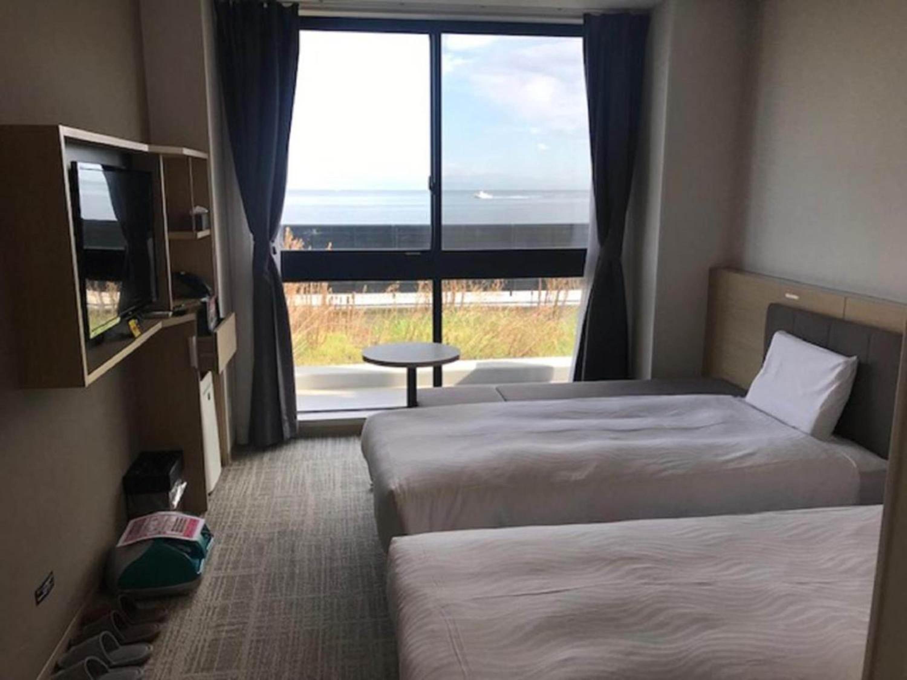 Standard Twin Room - Photo 20