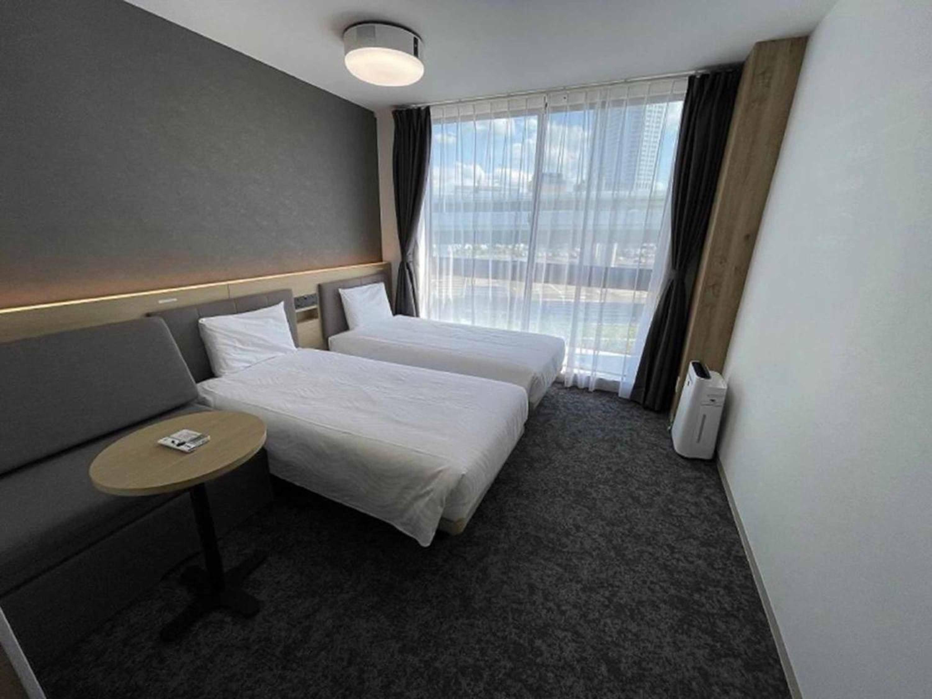 Triple Room with 2 Single Beds and 1 Sofa Bed - Photo 22