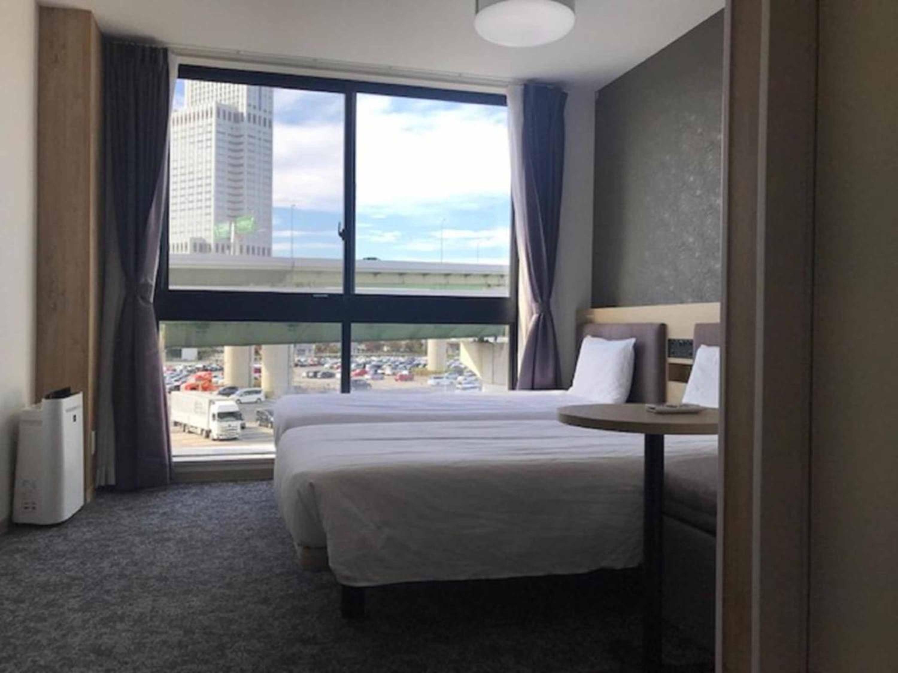 Triple Room with 2 Single Beds and 1 Sofa Bed - Photo 20