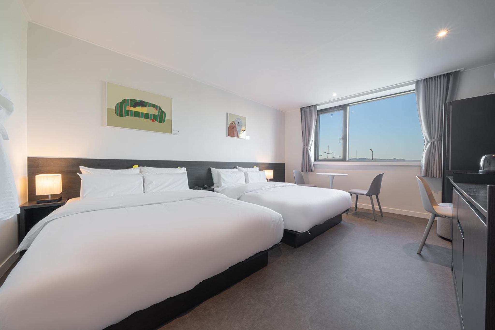 Deluxe Twin Room - Photo 10