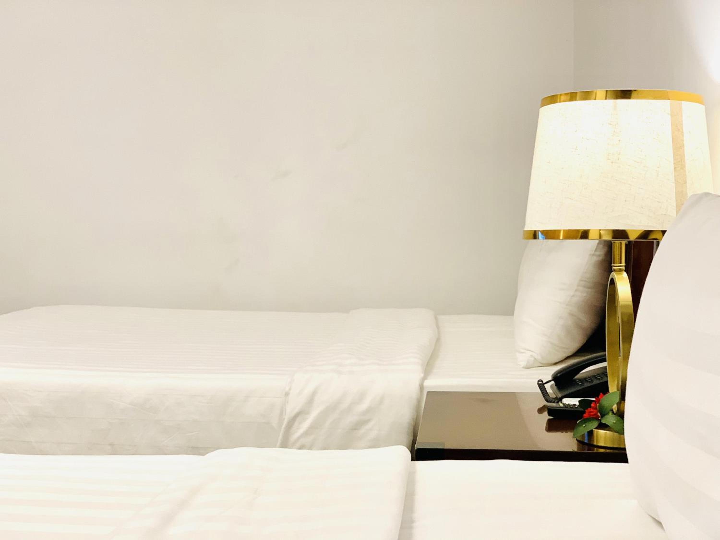 Deluxe Triple Room - Photo 8