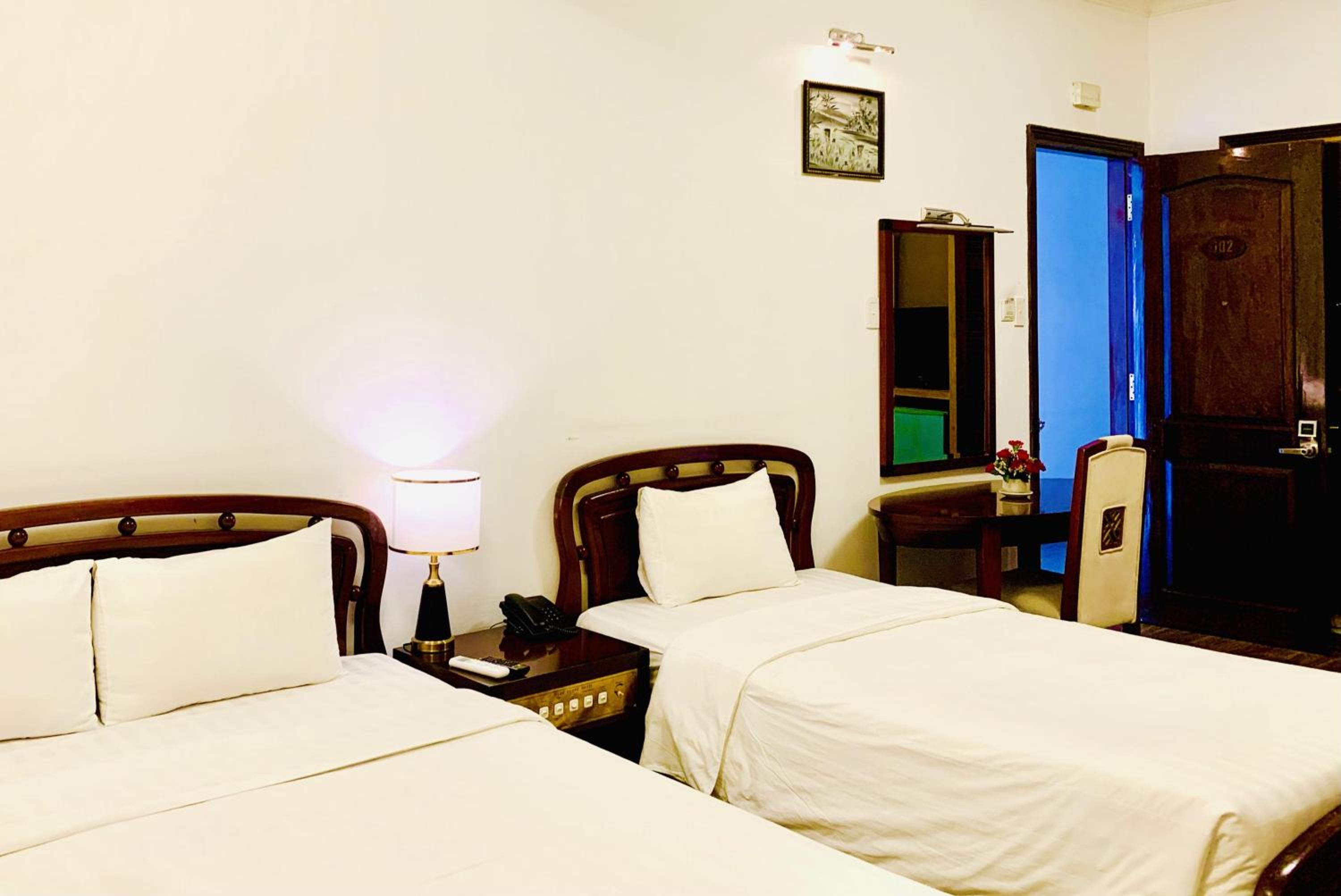 Deluxe Triple Room - Photo 3