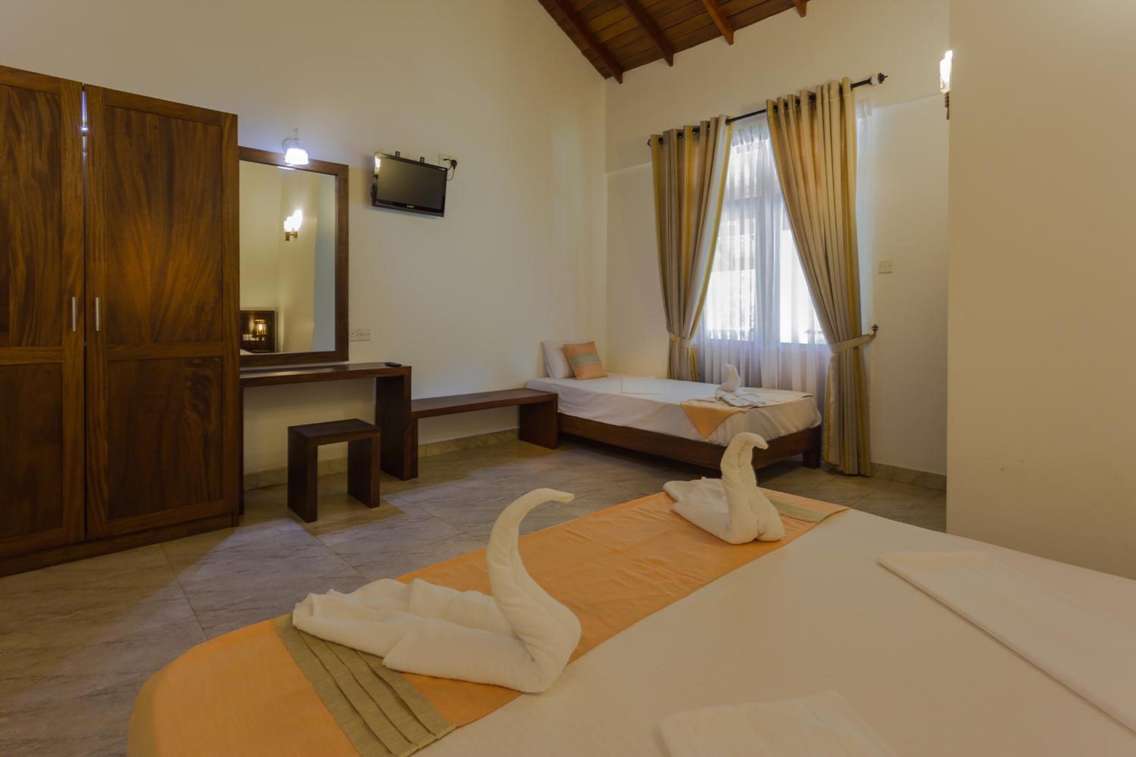 Deluxe Triple Room photo 3