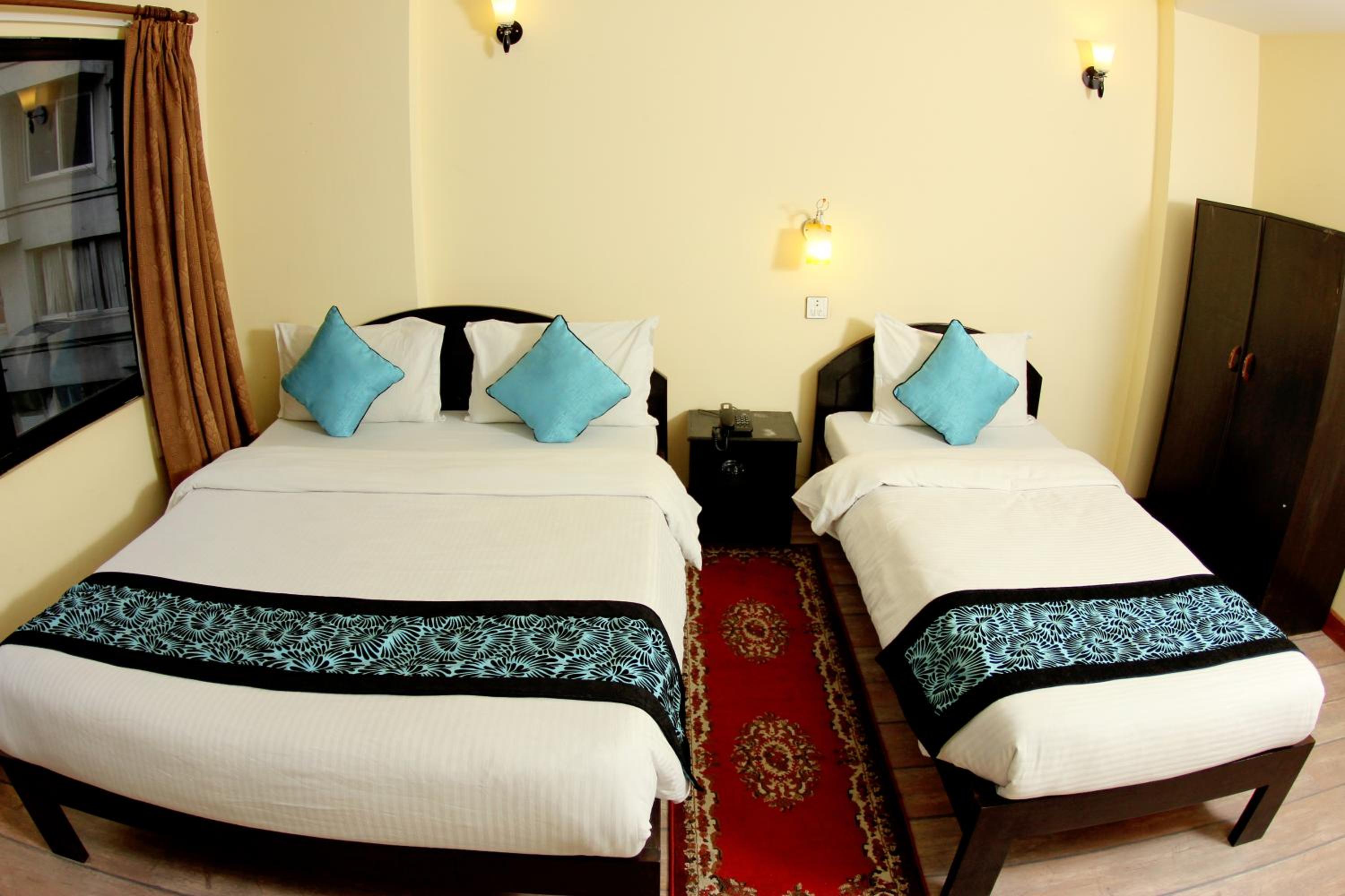 Deluxe Triple Room - Photo 1