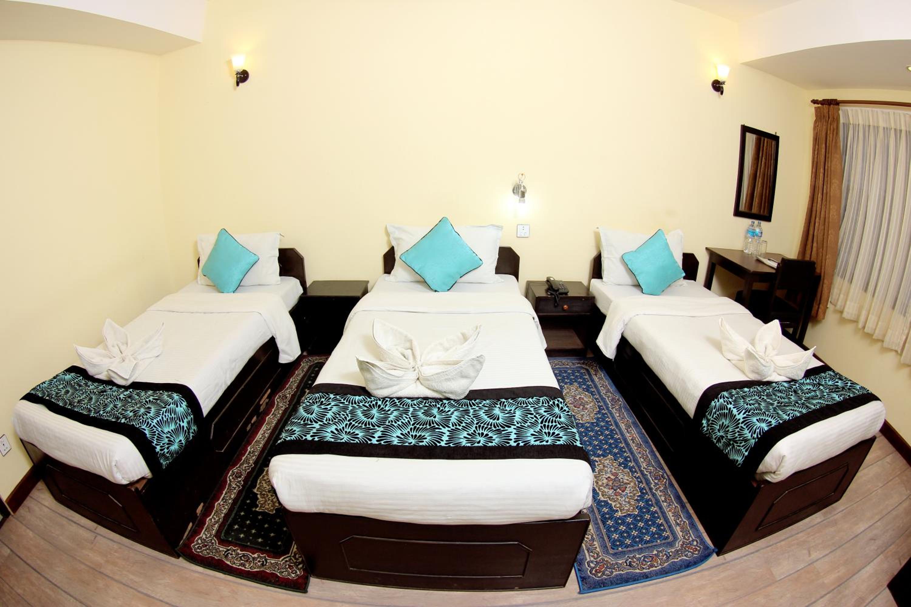Deluxe Triple Room - Photo 11