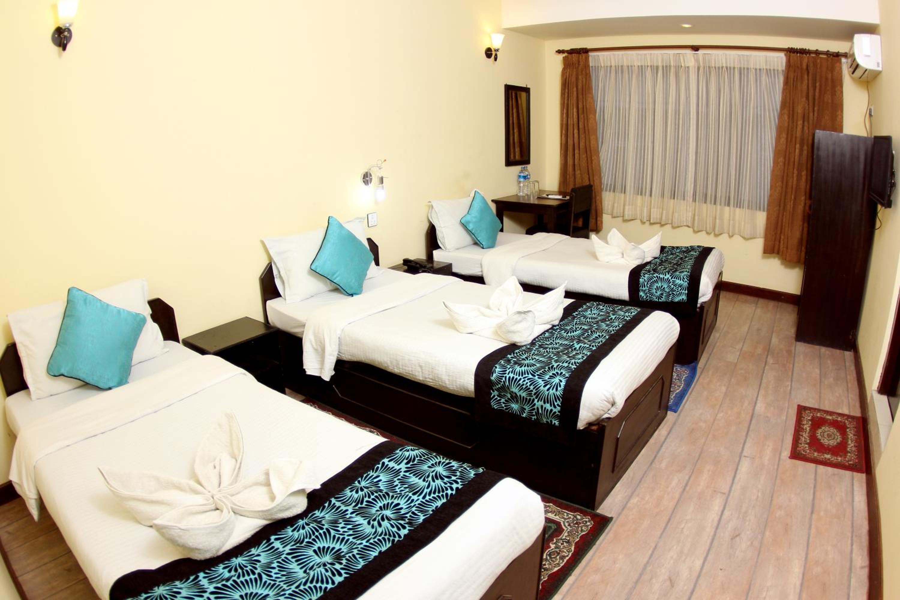 Deluxe Triple Room - Photo 10