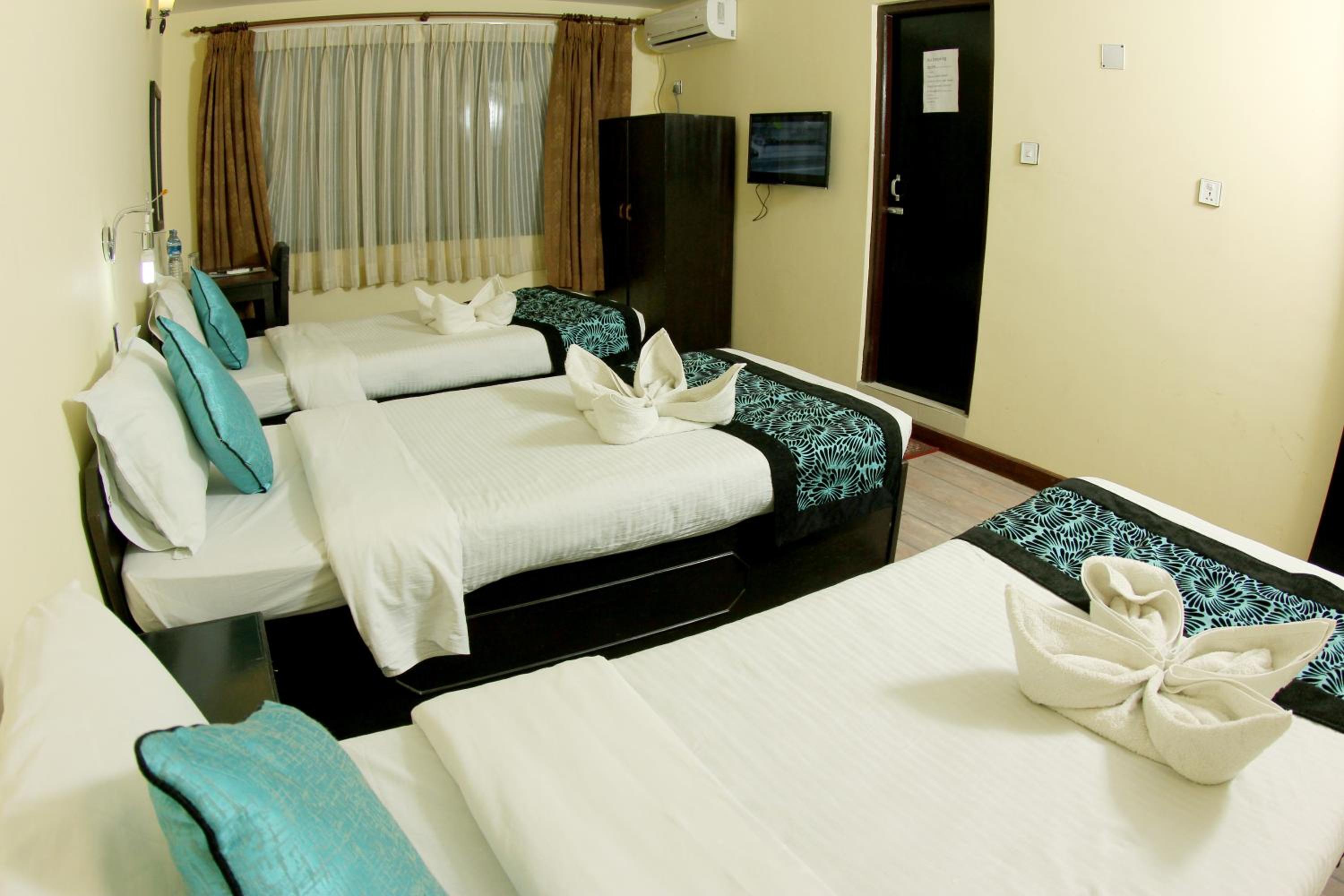 Deluxe Triple Room - Photo 7