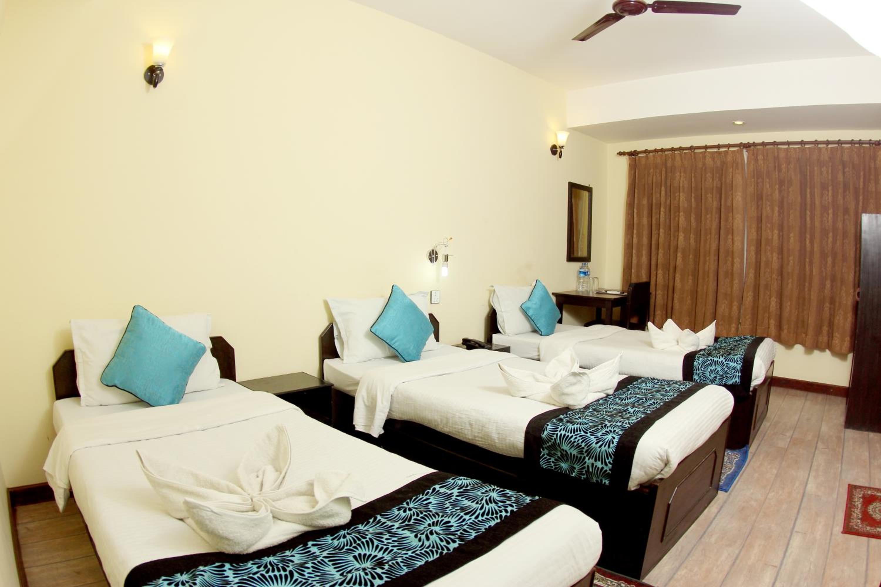 Deluxe Triple Room - Photo 9