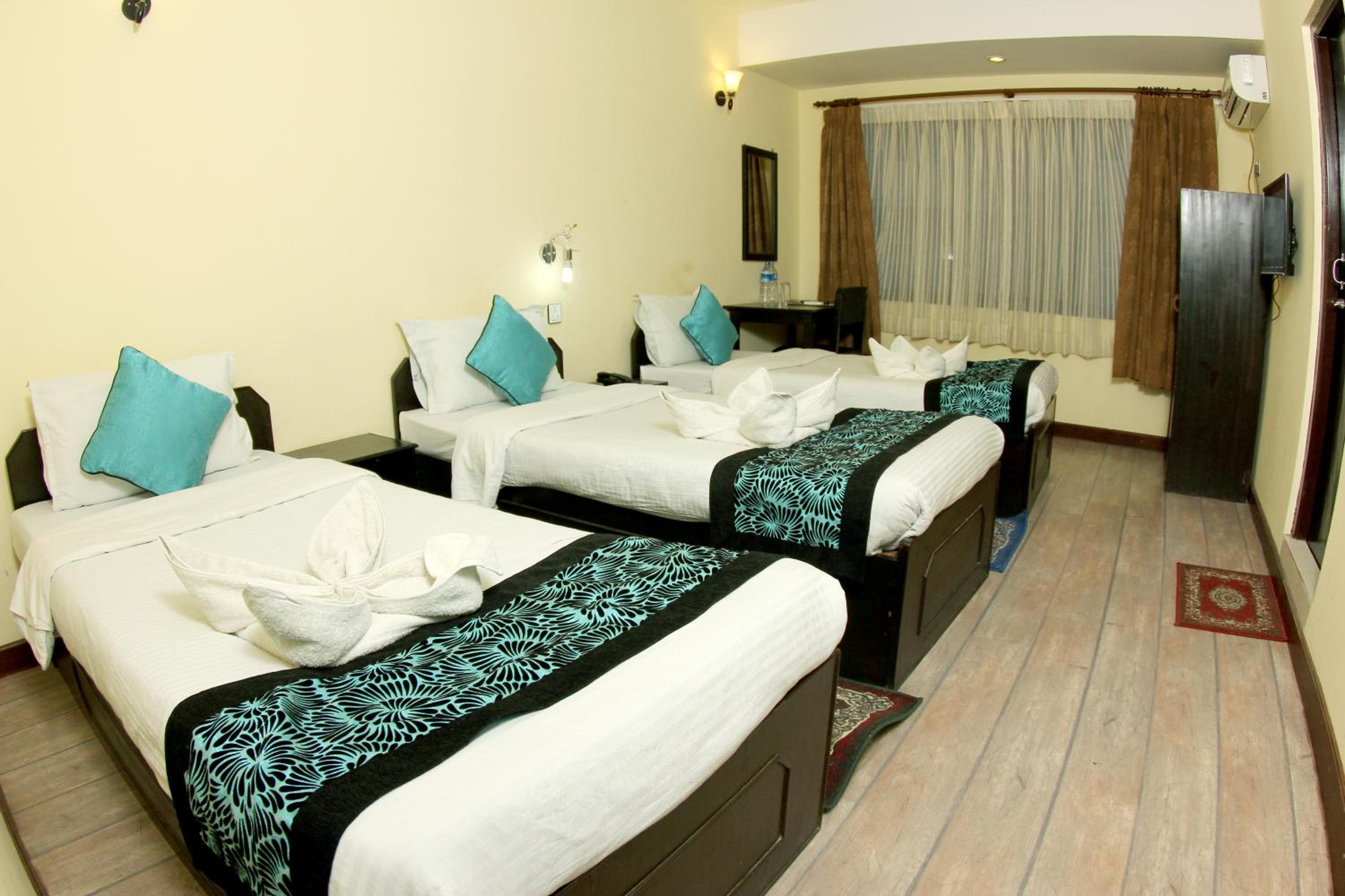 Deluxe Triple Room - Photo 8