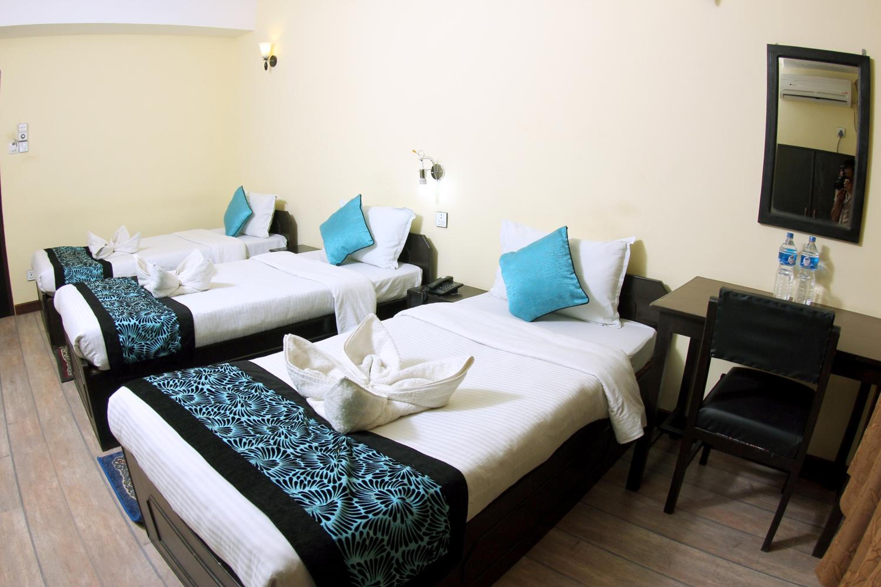 Deluxe Triple Room - Photo 2