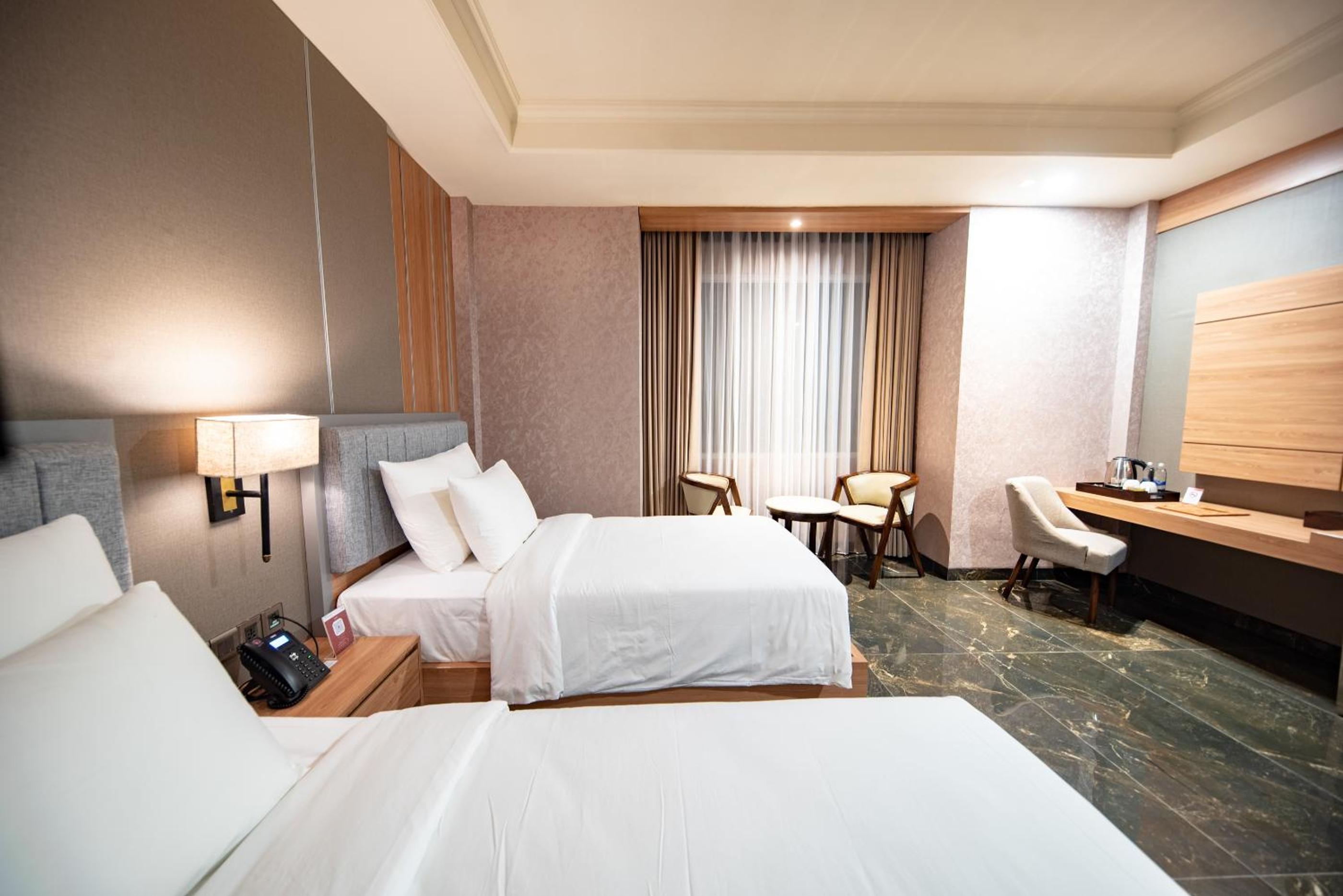 Deluxe Twin Room - Photo 2