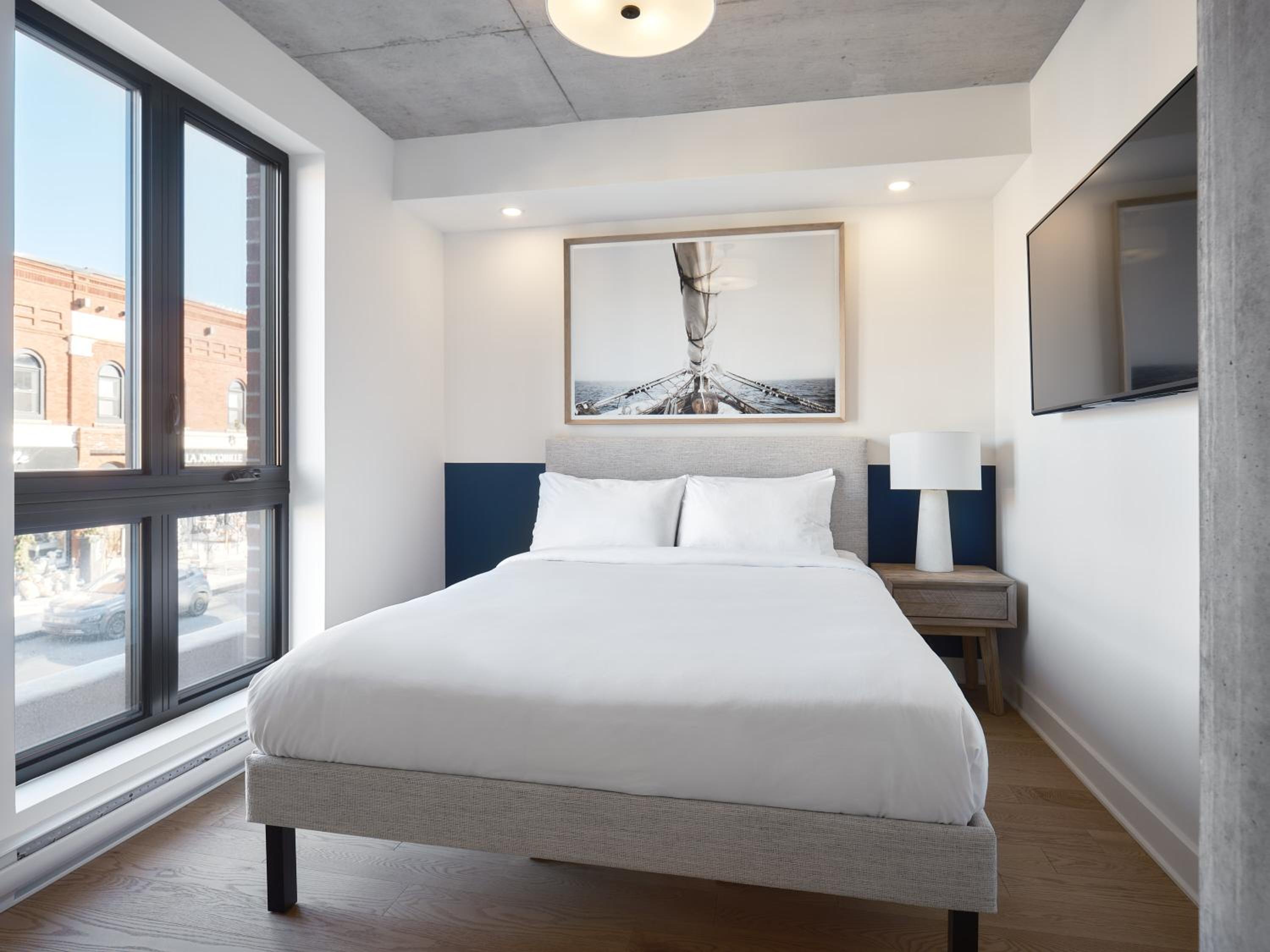 201 - 2nd Floor Office Suite, Queen Bed, Main St. View