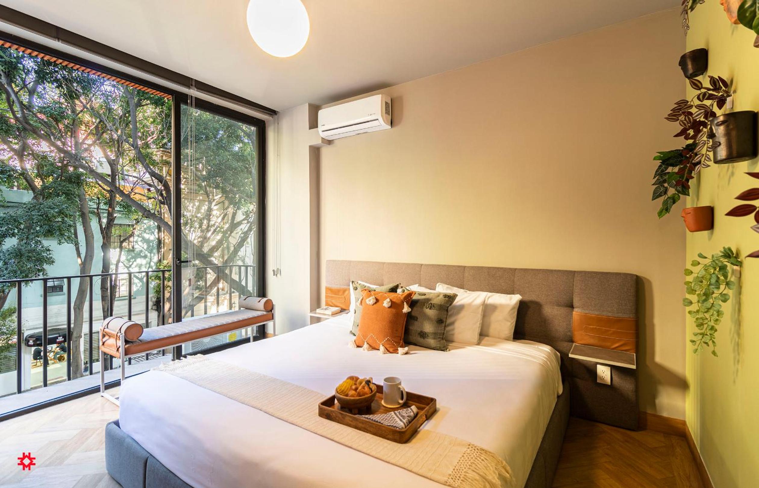 One-Bedroom Apartment with Balcony and City View - Photo 20