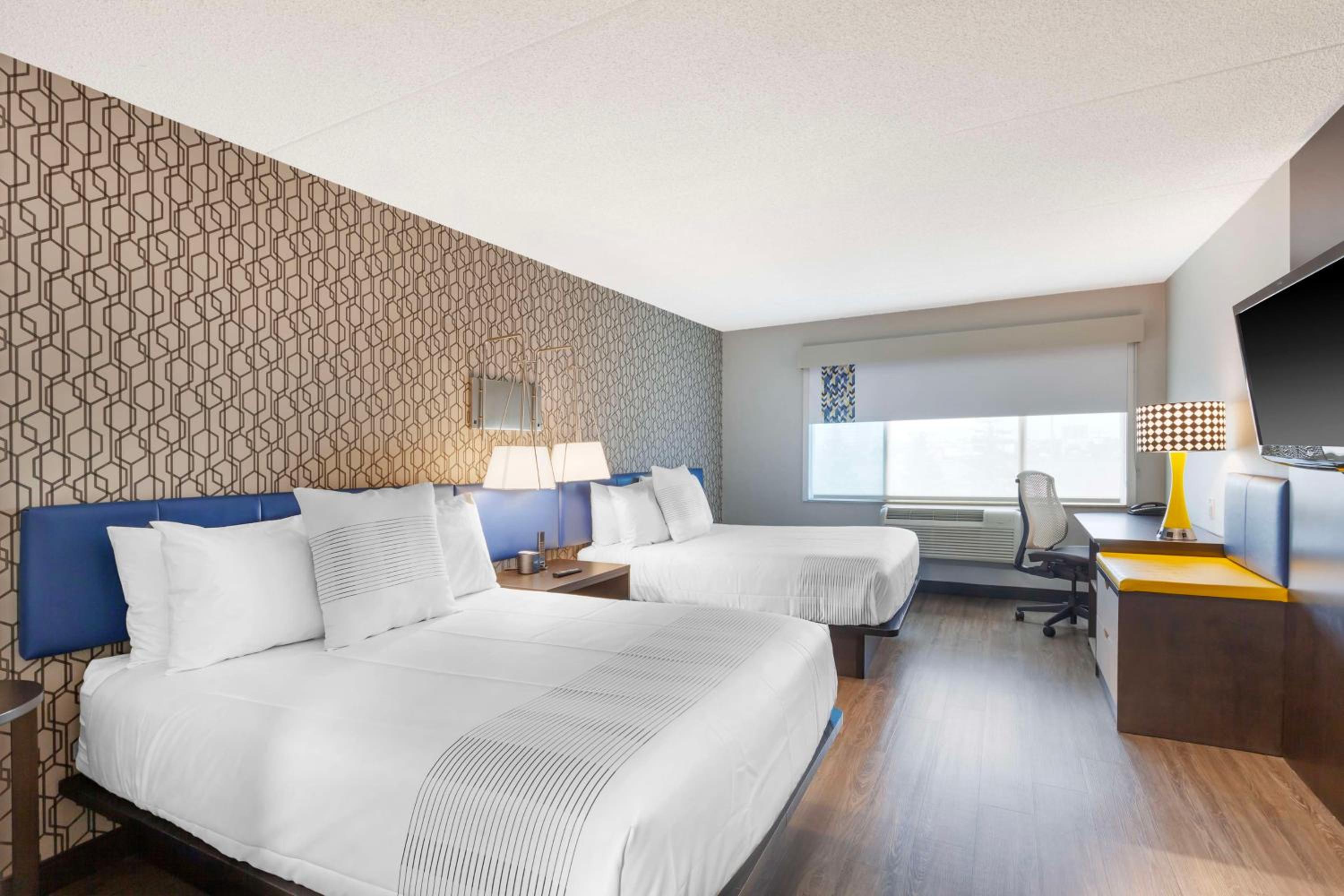 Queen Room with Two Queen Beds and Walk-In Shower - Photo 1