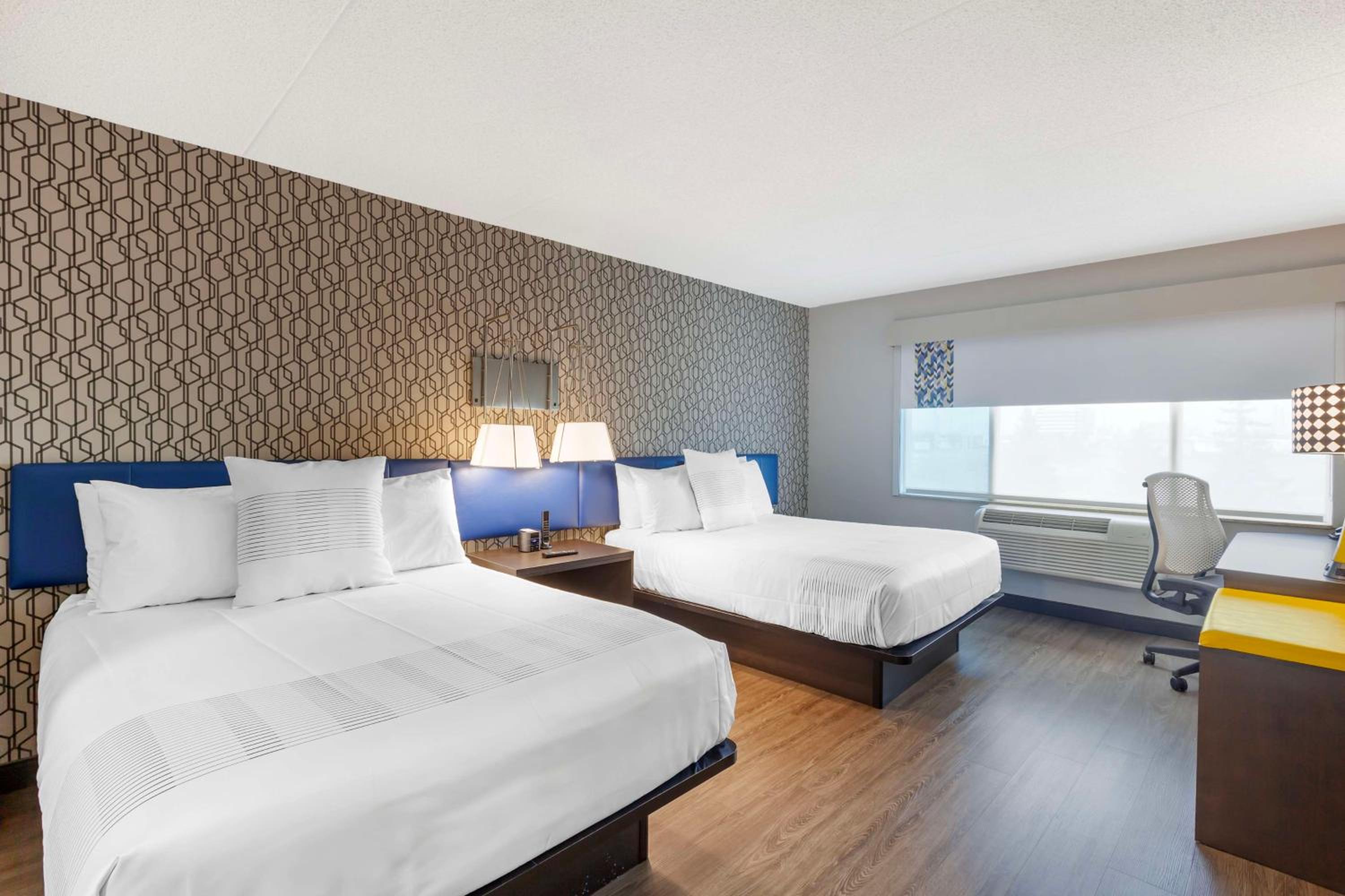 Queen Room with Two Queen Beds and Walk-In Shower - Photo 4